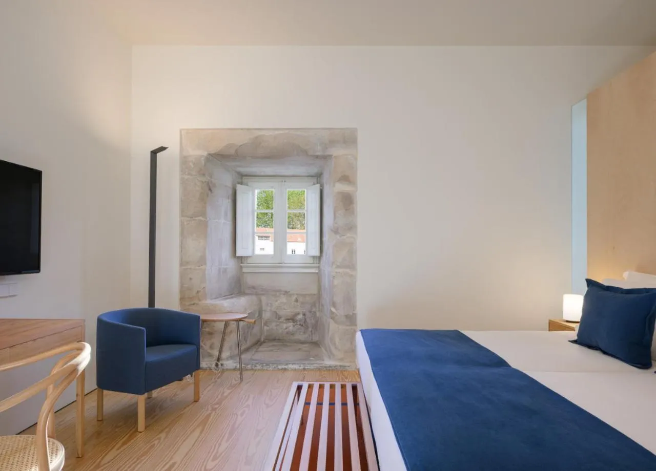 Bed in Montebelo Mosteiro de Alcobaça Historic Hotel