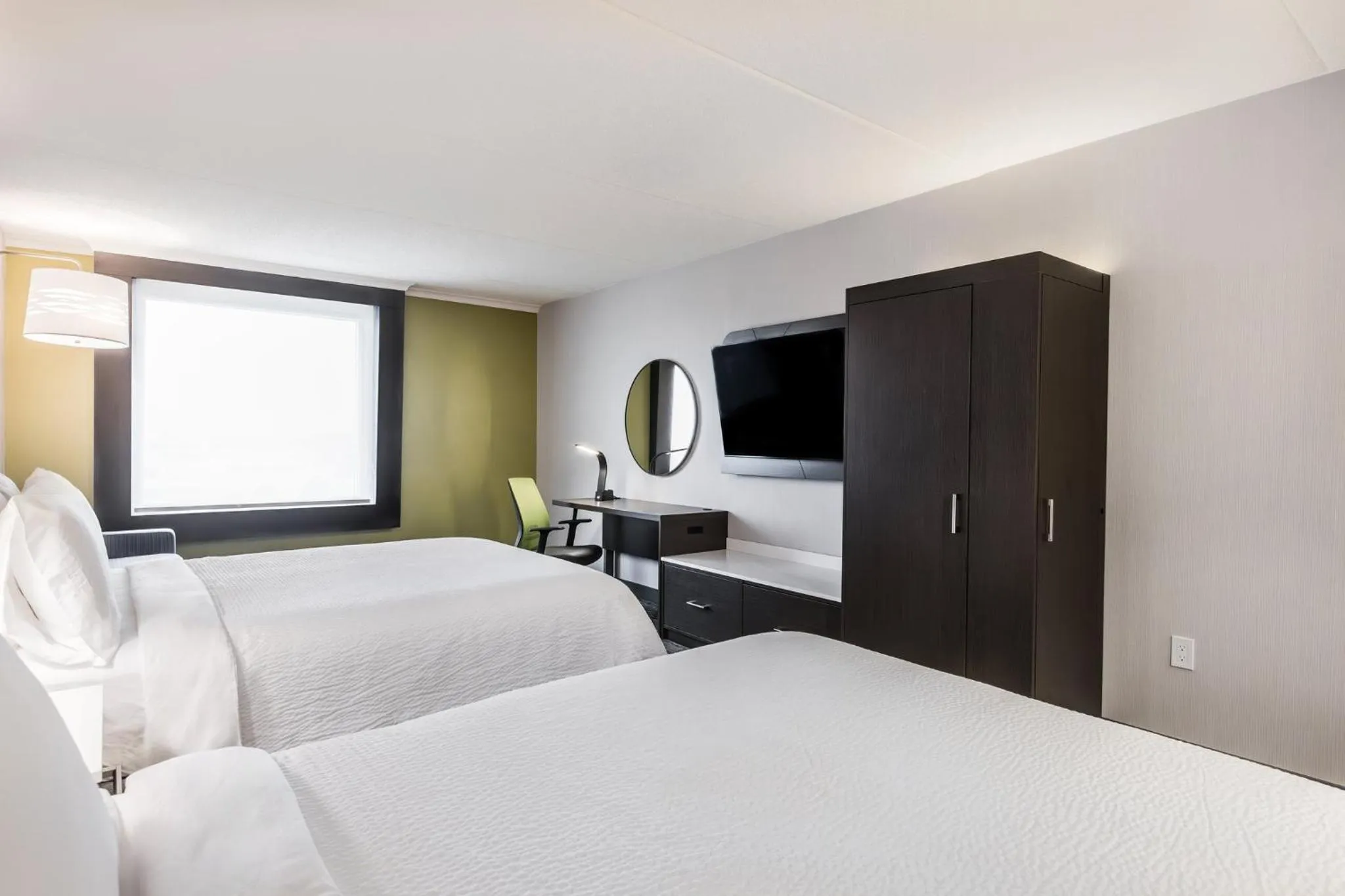Photo of the whole room, Bed in Holiday Inn Express & Suites Toronto Airport South by IHG