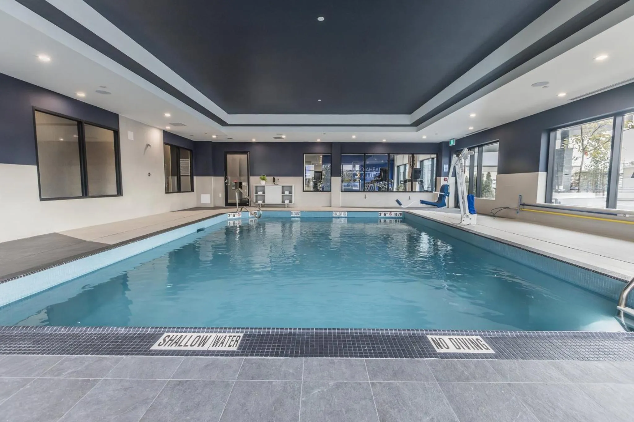 Swimming pool in Holiday Inn Express & Suites Toronto Airport South by IHG