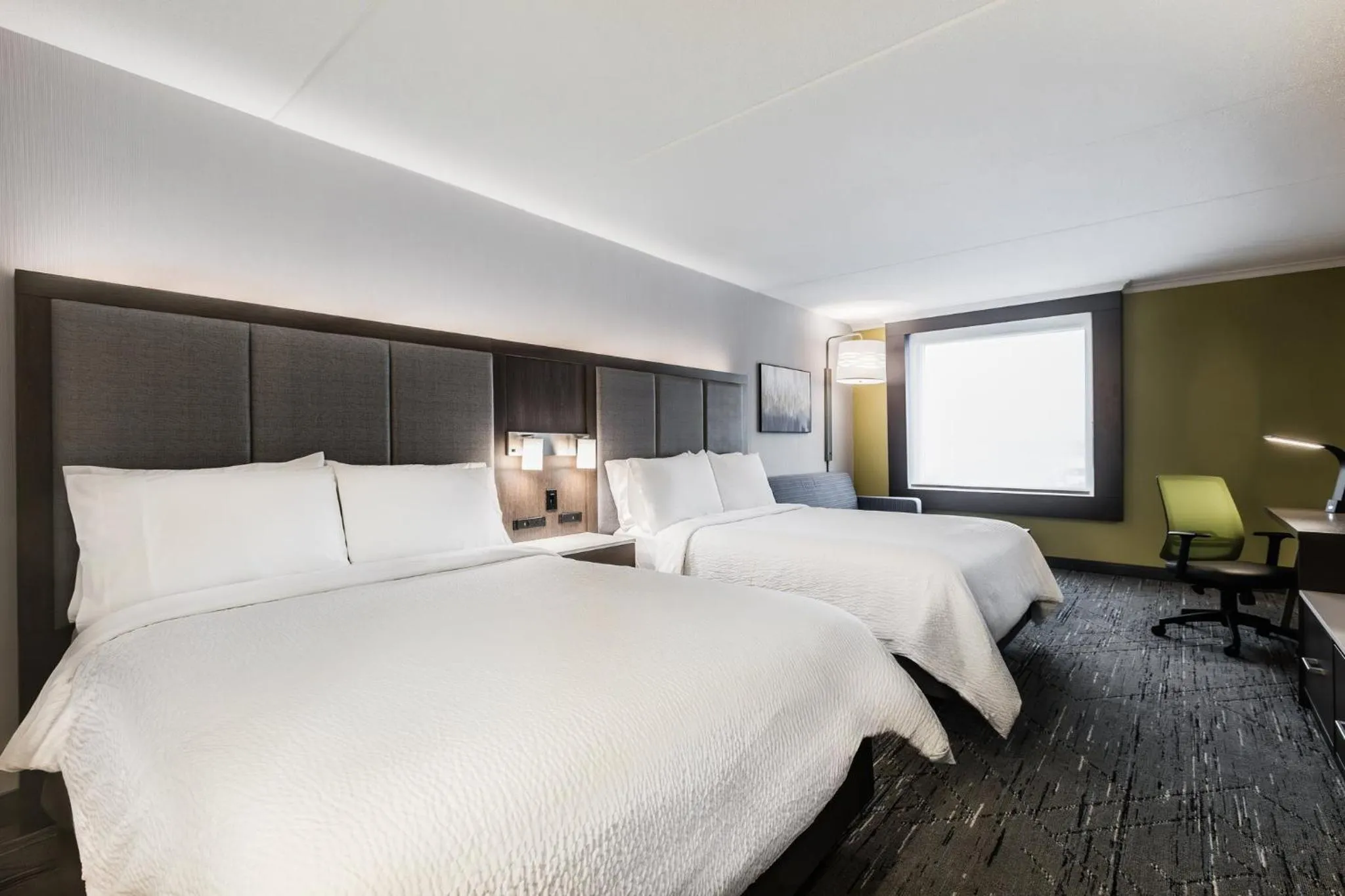 Photo of the whole room, Bed in Holiday Inn Express & Suites Toronto Airport South by IHG