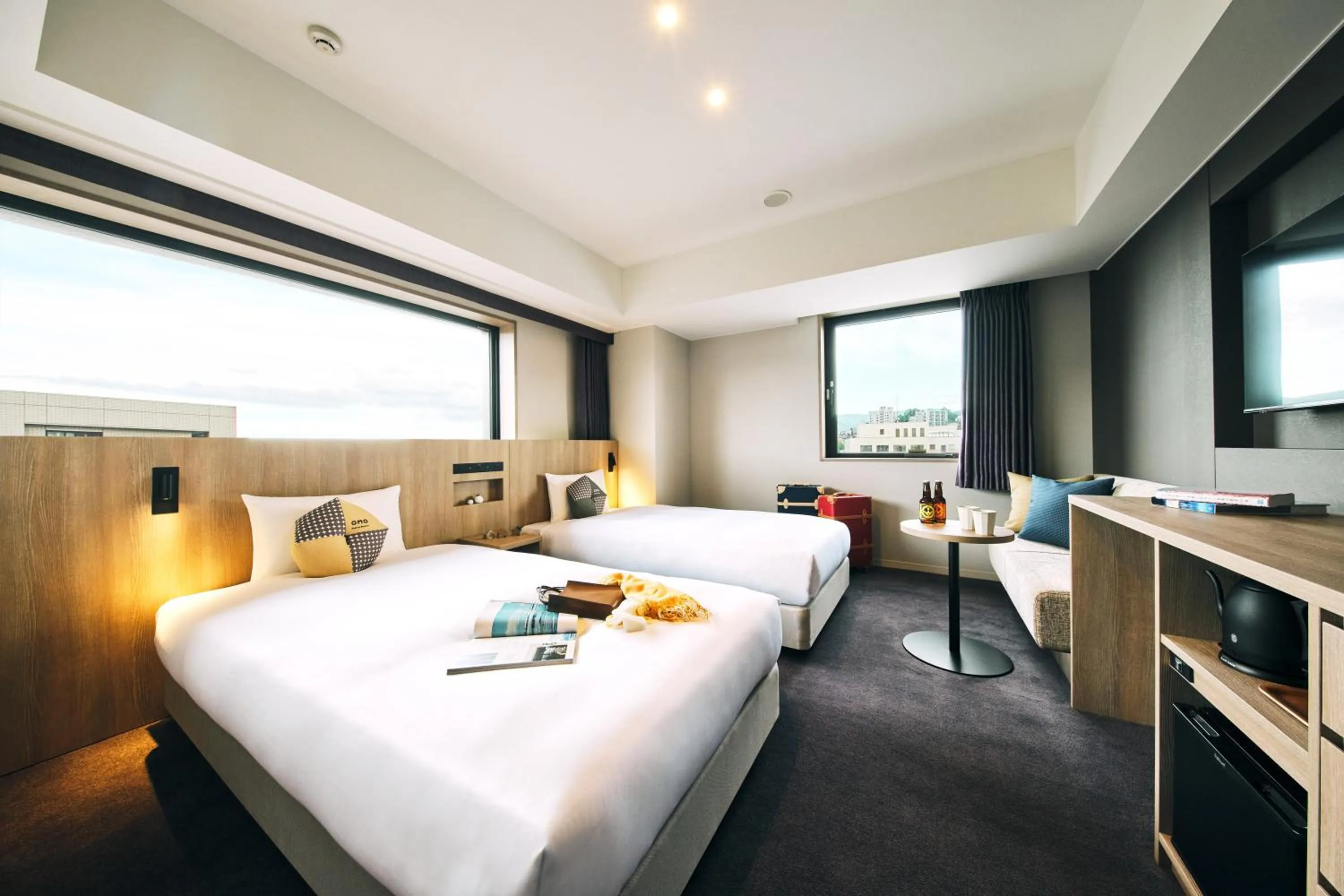 Photo of the whole room, Bed in OMO5 Otaru by Hoshino Resorts