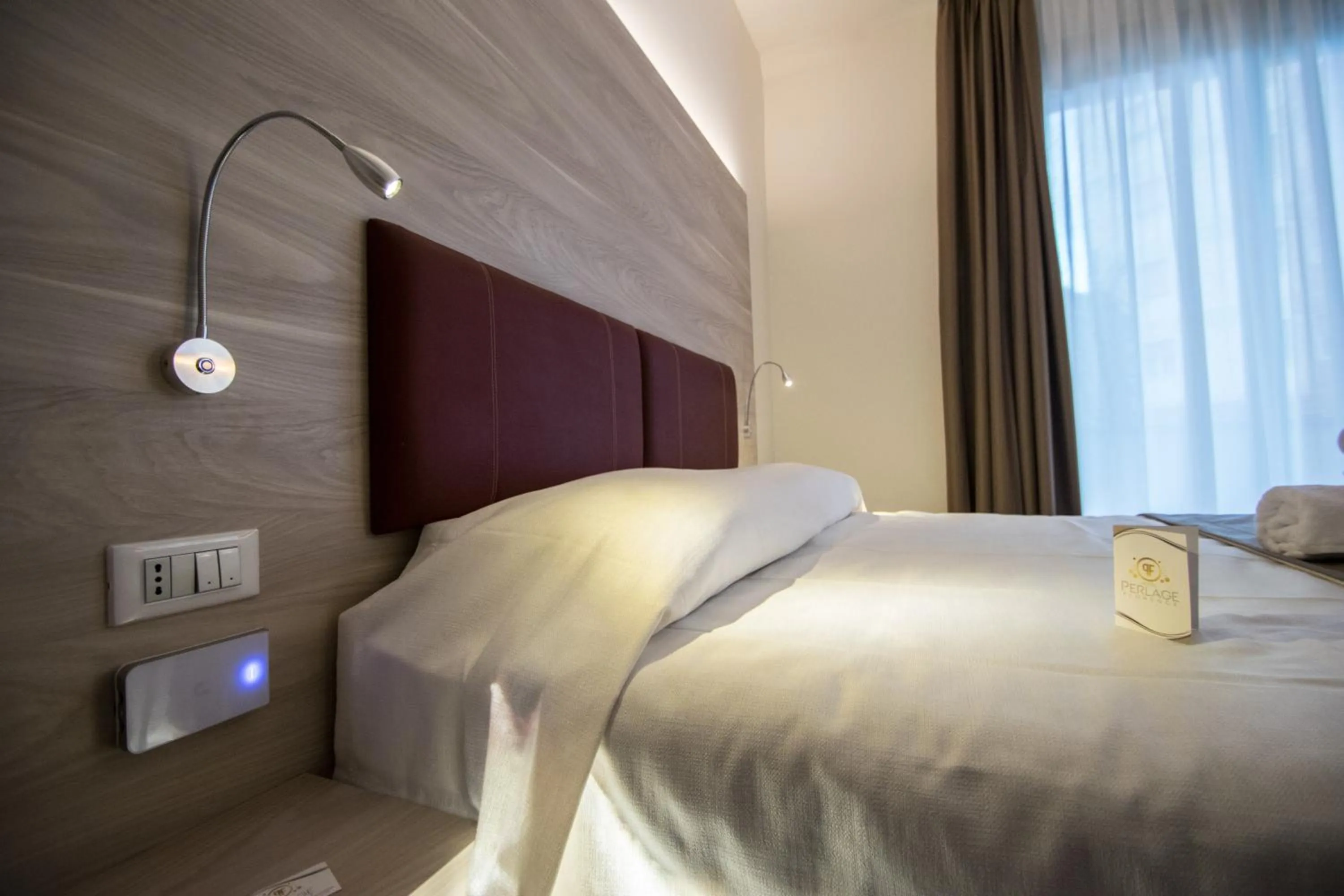 Decorative detail, Bed in Hotel Perlage Florence - Free city tax with Private Parking & Fast Wifi