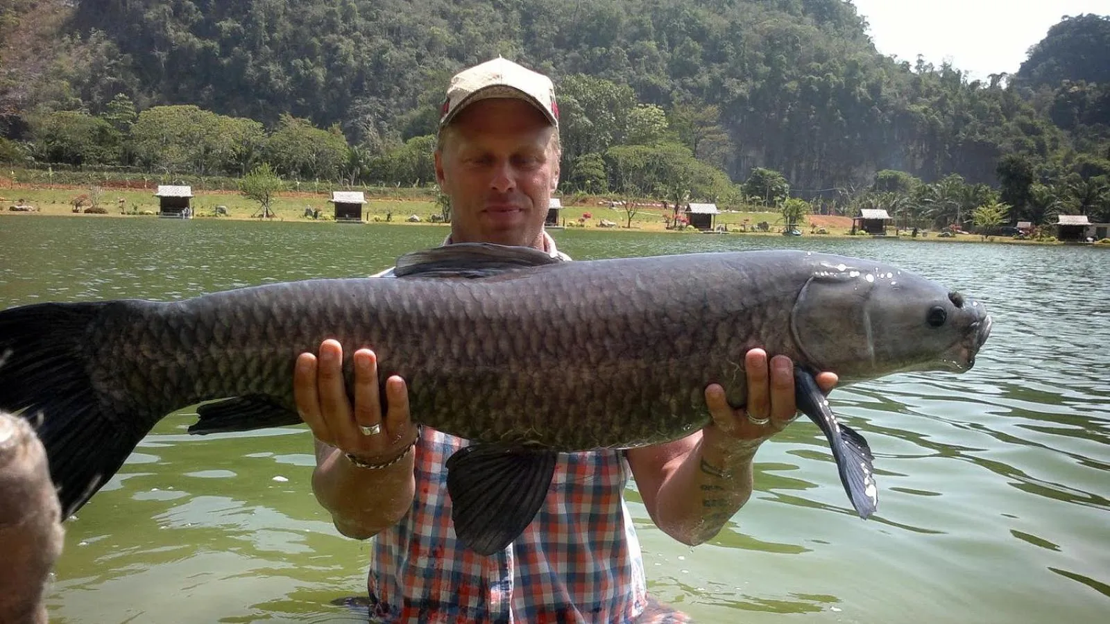 Fishing in Swiss Chalet Garden, Pool Resort