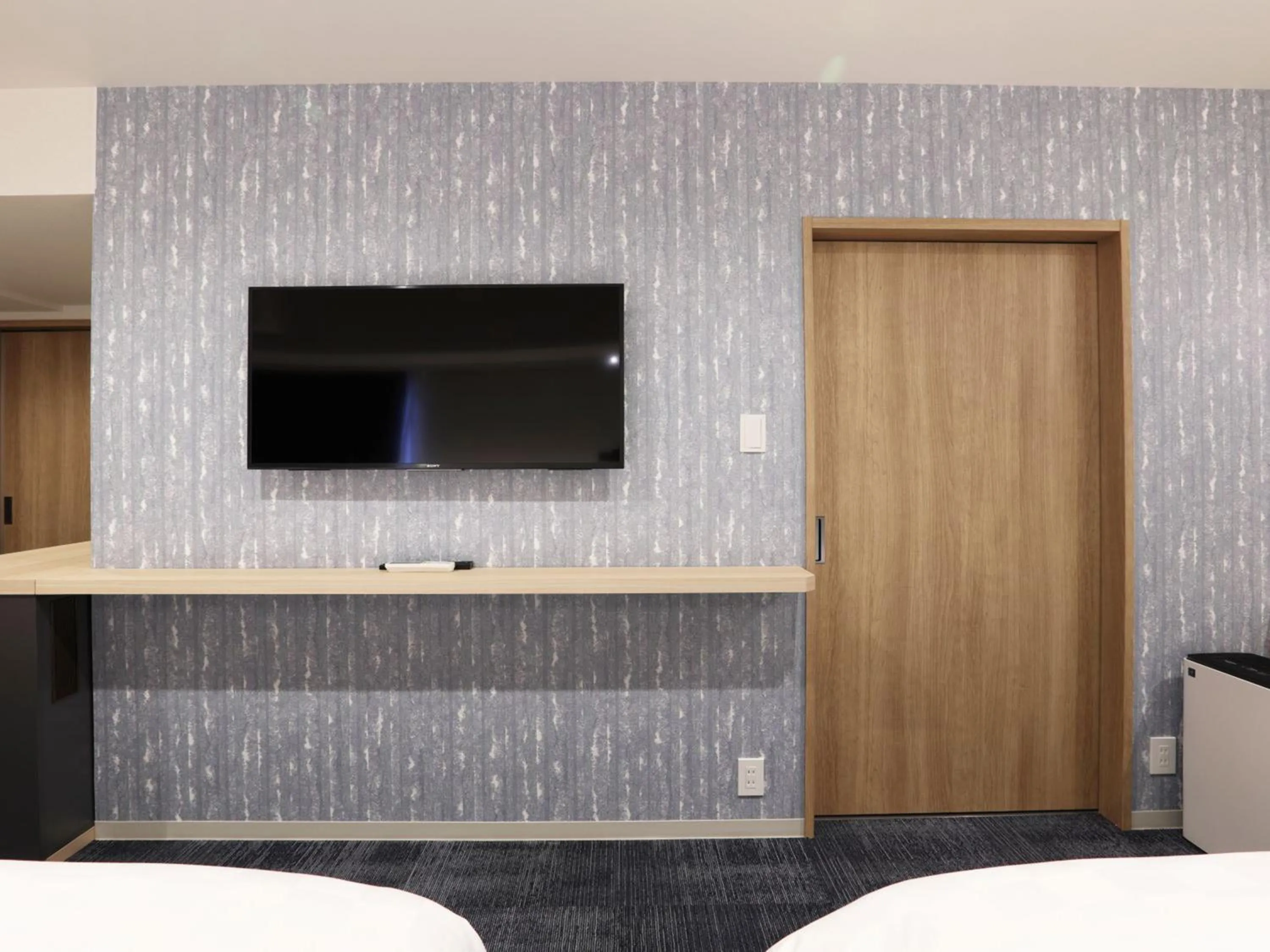 Photo of the whole room, Bed in Henn na Hotel Premier Nagoya Fushimiekimae