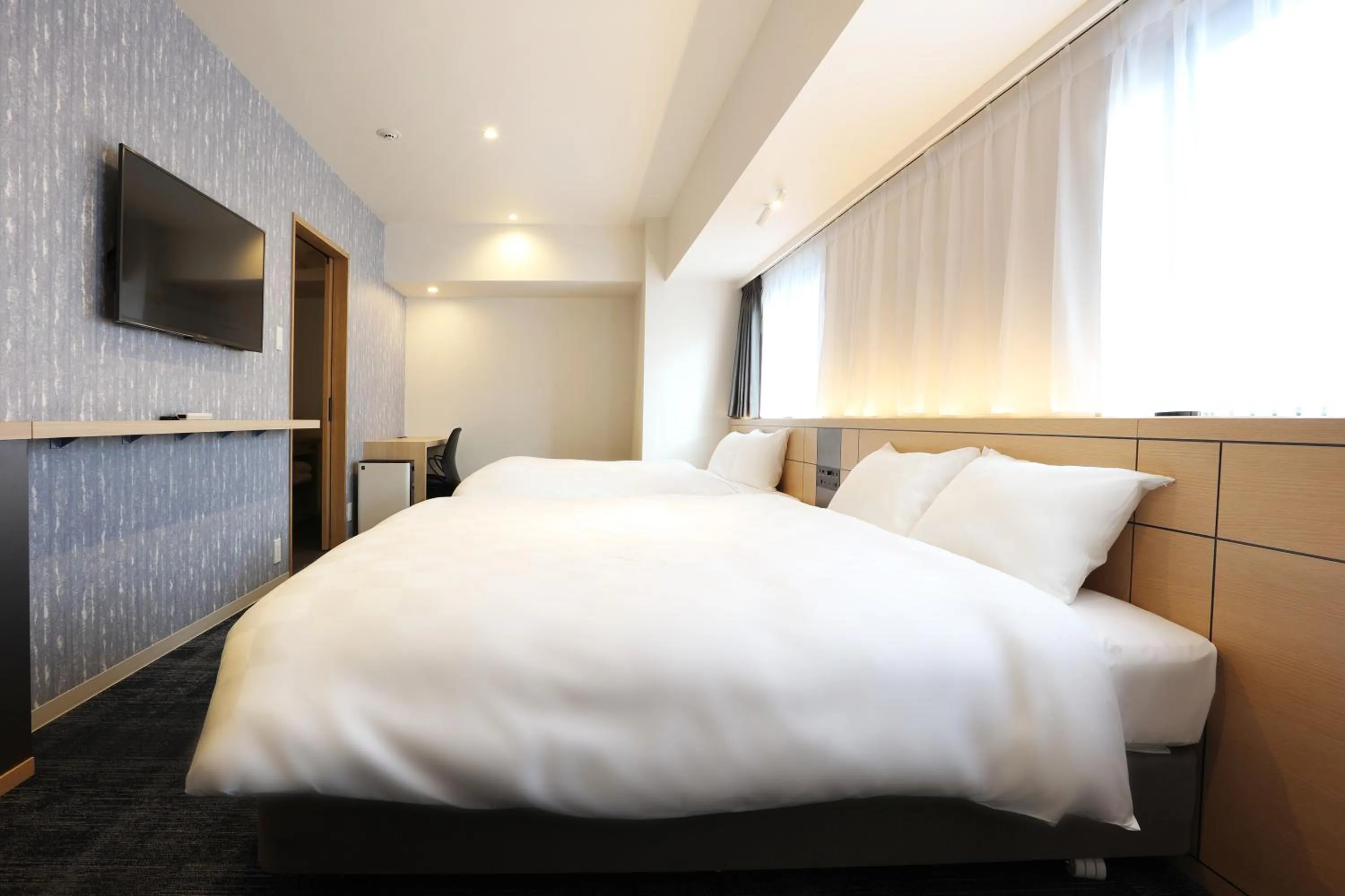 Photo of the whole room, Bed in Henn na Hotel Premier Nagoya Fushimiekimae