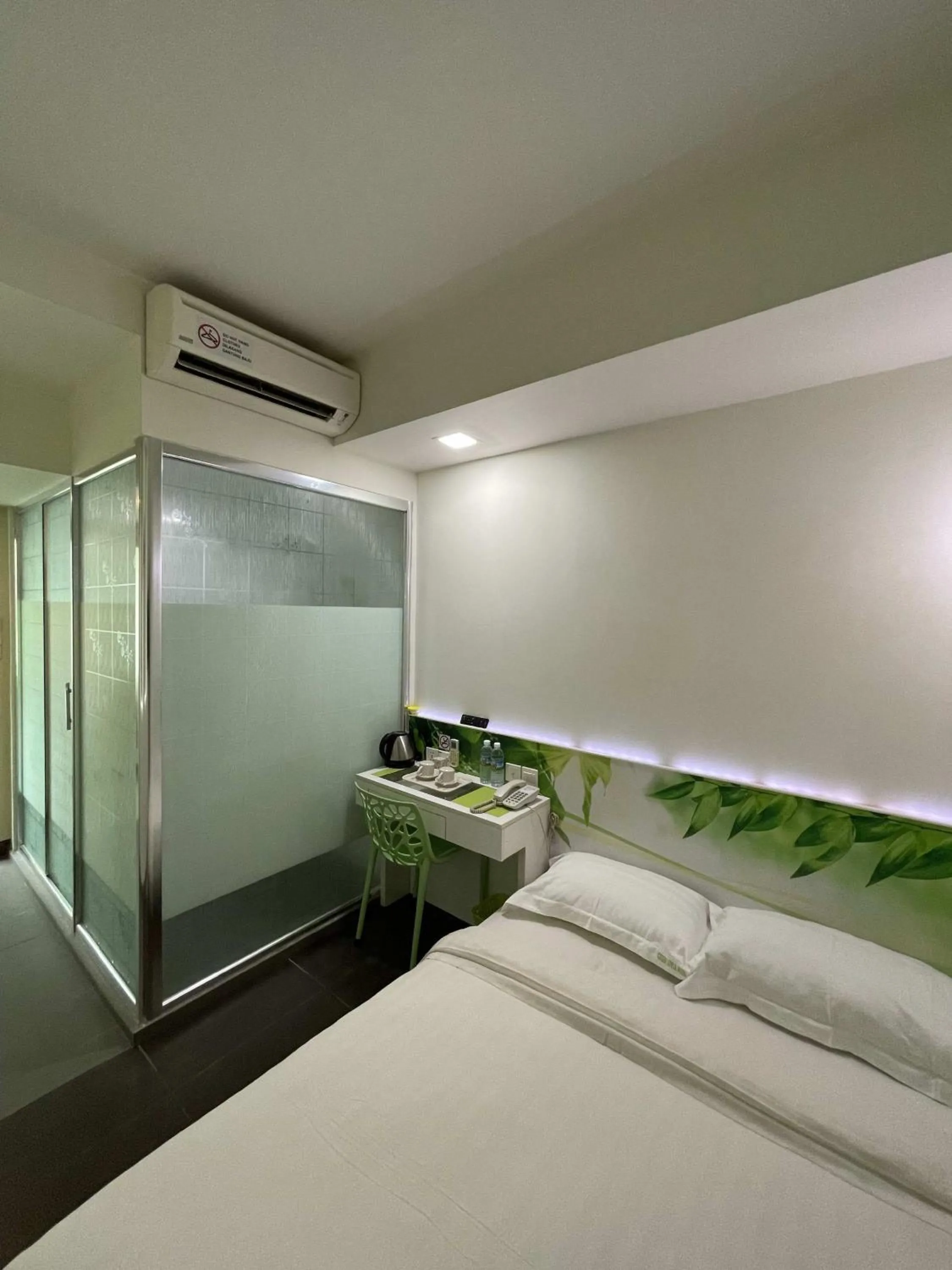 Bed in Green Apple Boutique Hotel