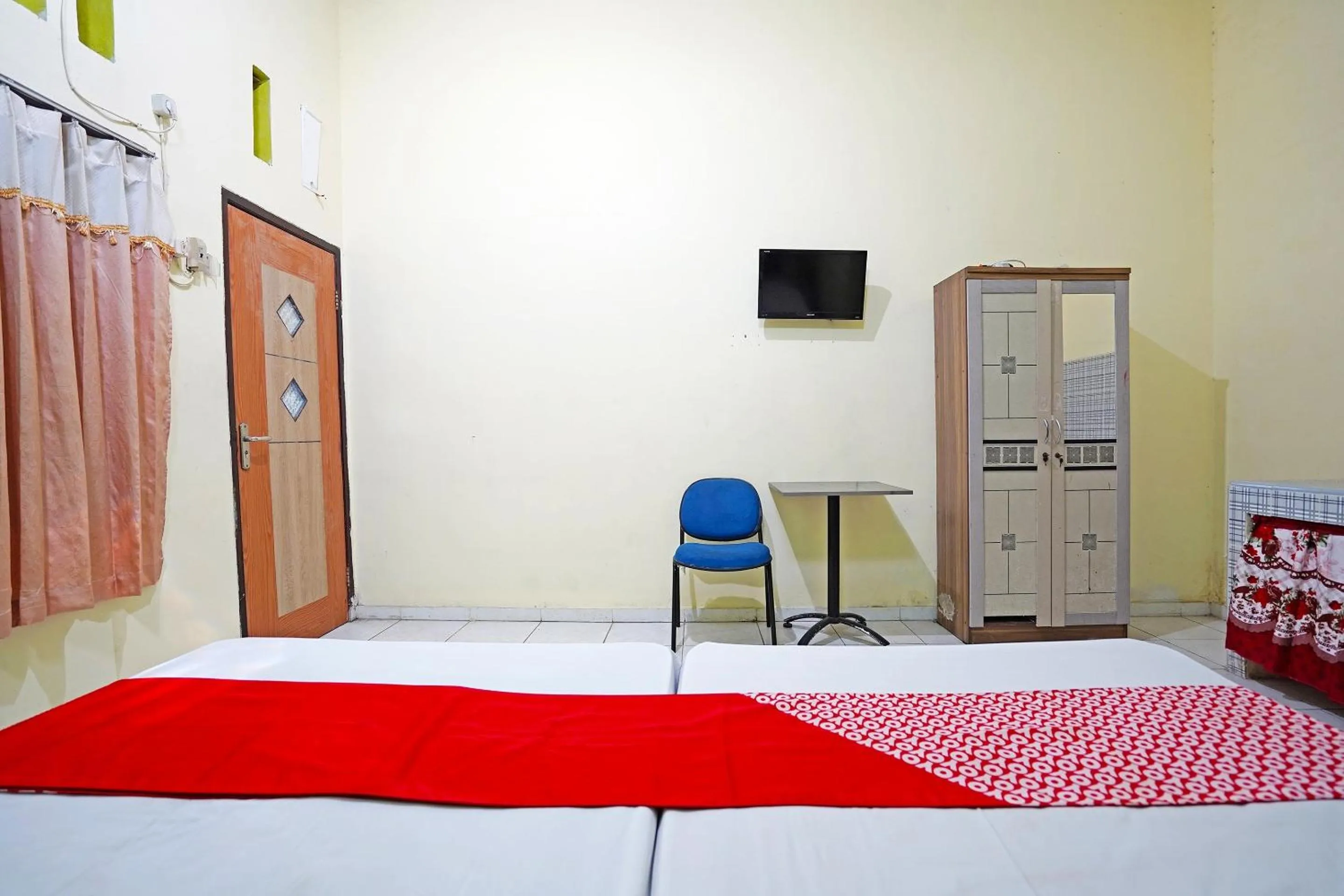 Bedroom in OYO 91583 D’cost Green Syariah