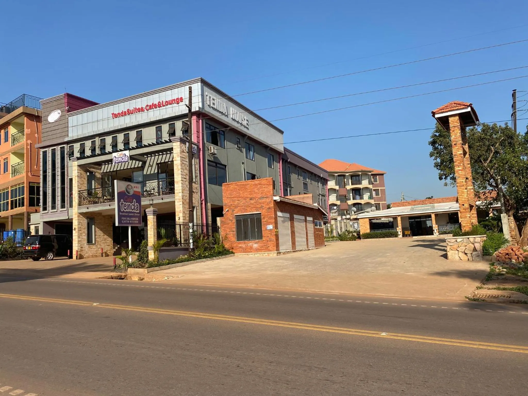 Property building in Tenda Suites and Restaurant