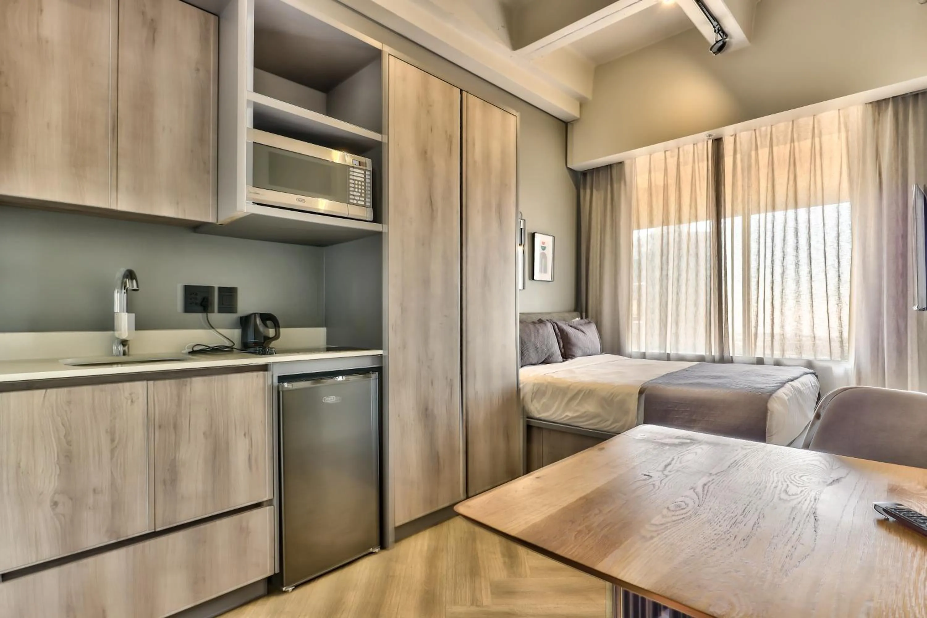 Bed in WINK Aparthotel One Thibault