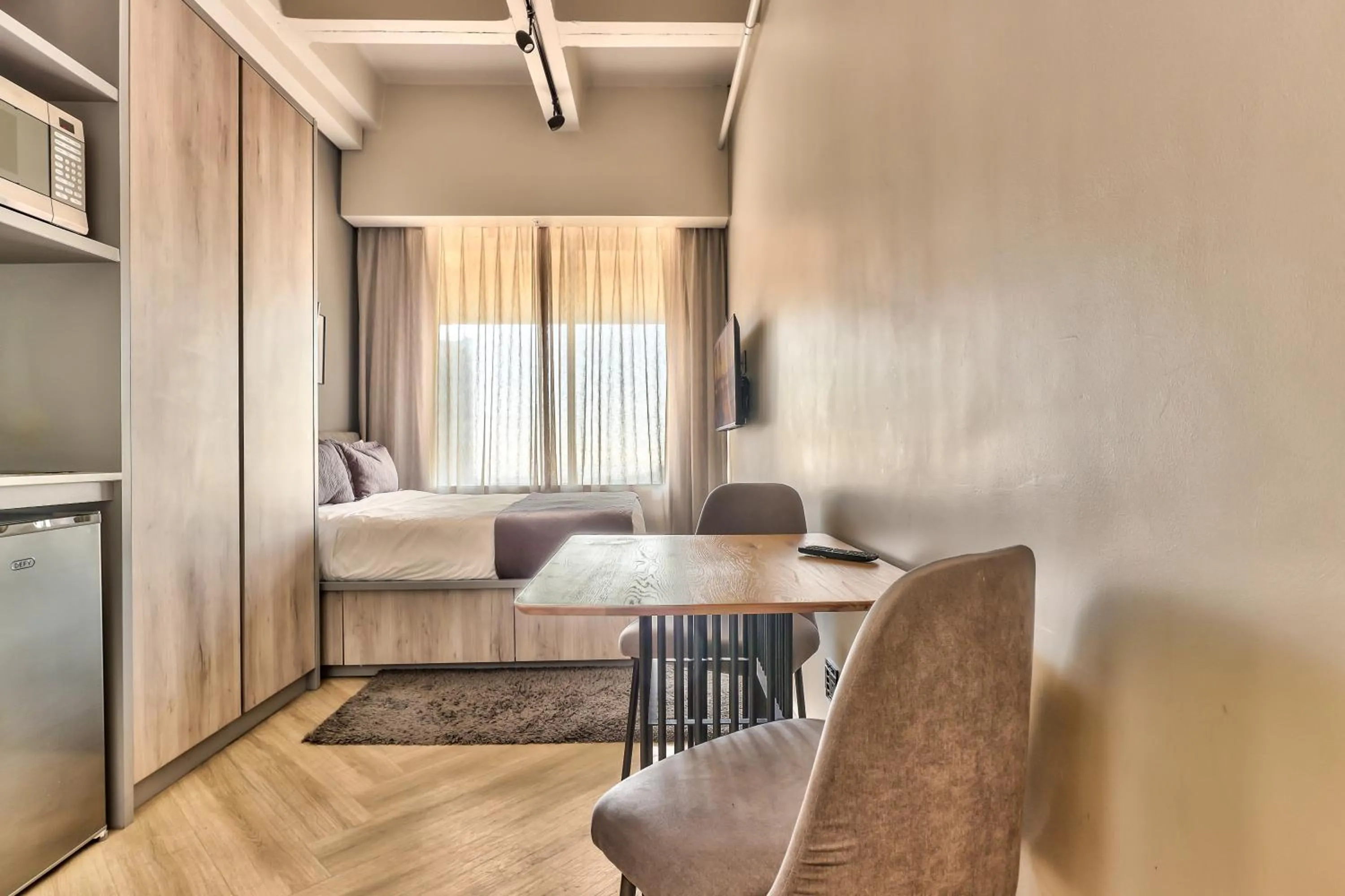 Bed in WINK Aparthotel One Thibault