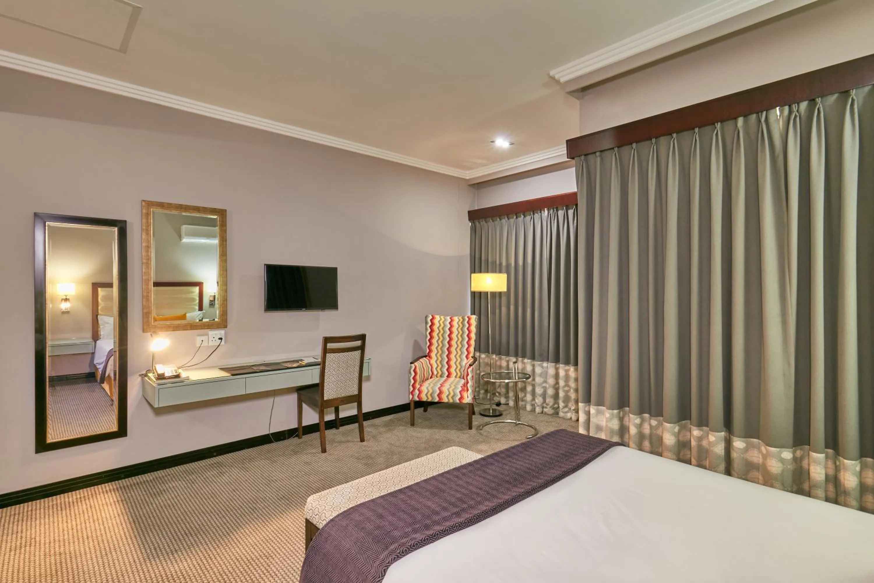 Bed in Regent Select Hotel