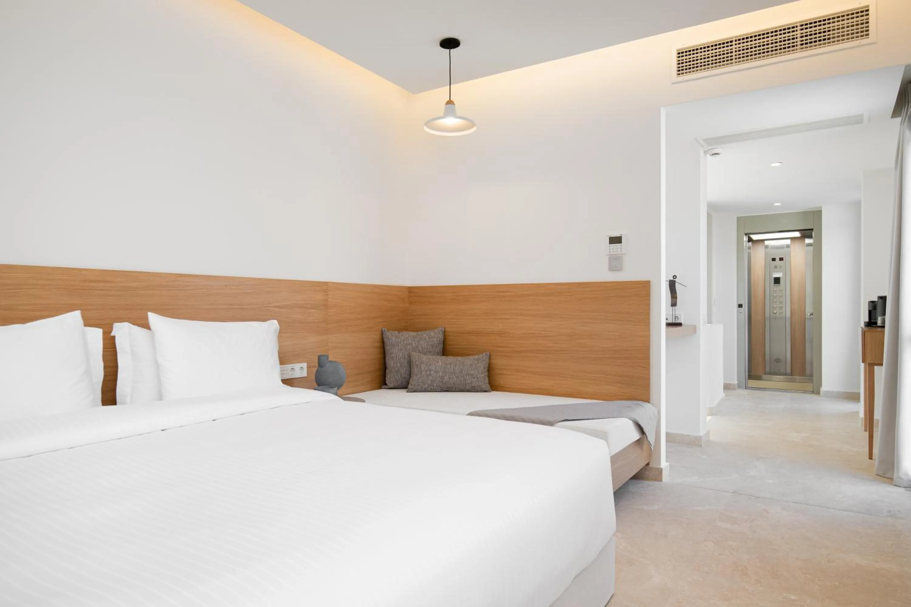 Photo of the whole room, Bed in Altar Suites