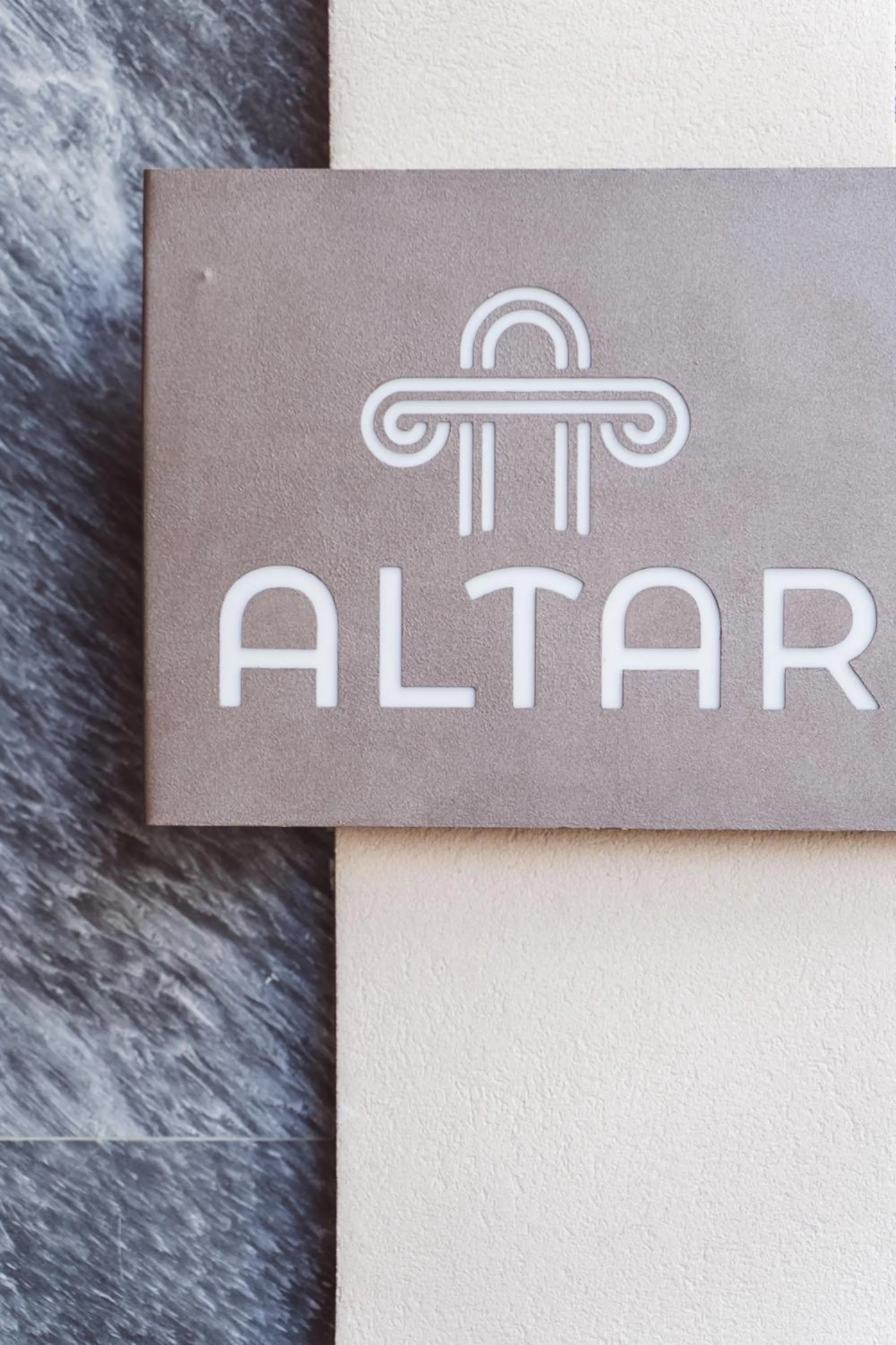 Property logo or sign in Altar Suites