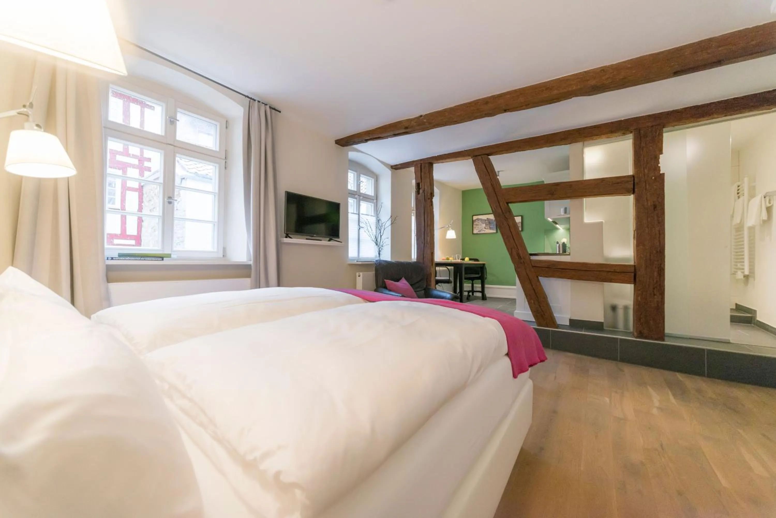 Photo of the whole room, Bed in Gästehaus am Marktbrunnen