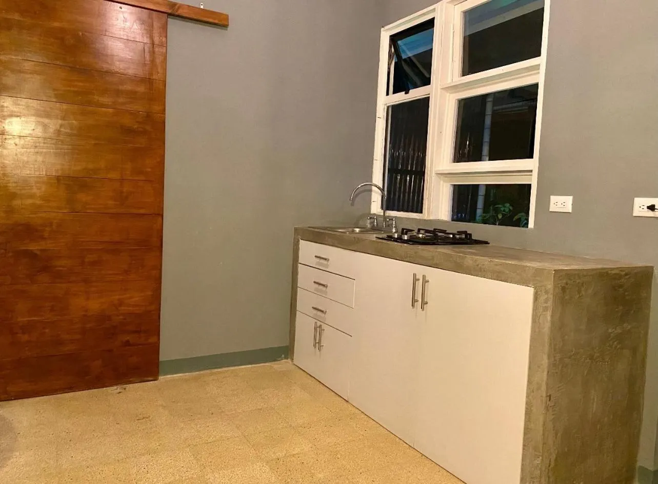 Kitchen or kitchenette in Otoya 1907 Hotel