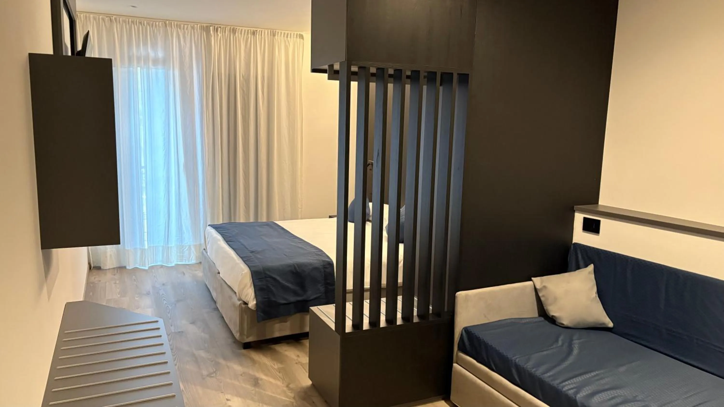 Bed in Albergo Cappello e Cadore