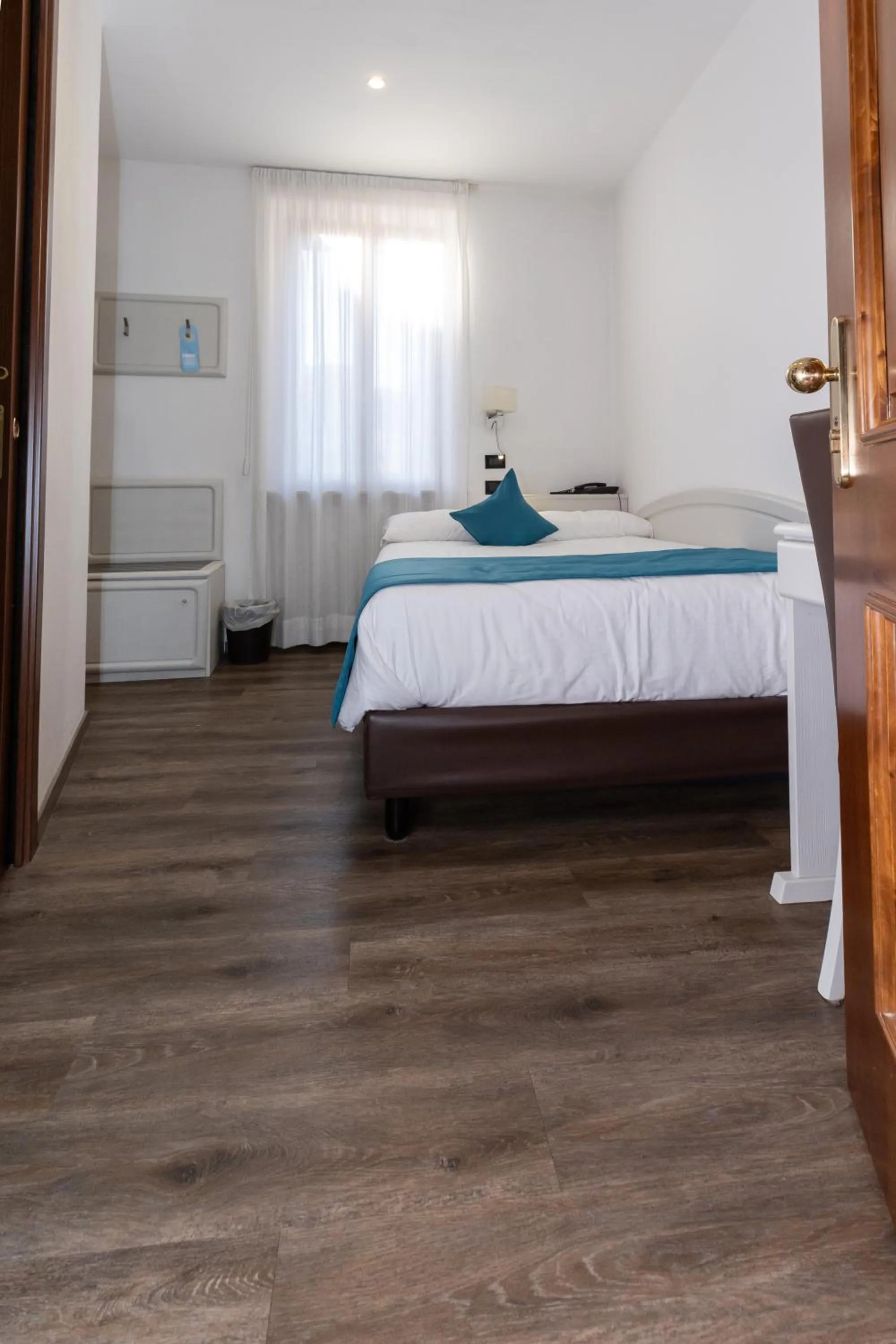 Bed in Albergo Cappello e Cadore