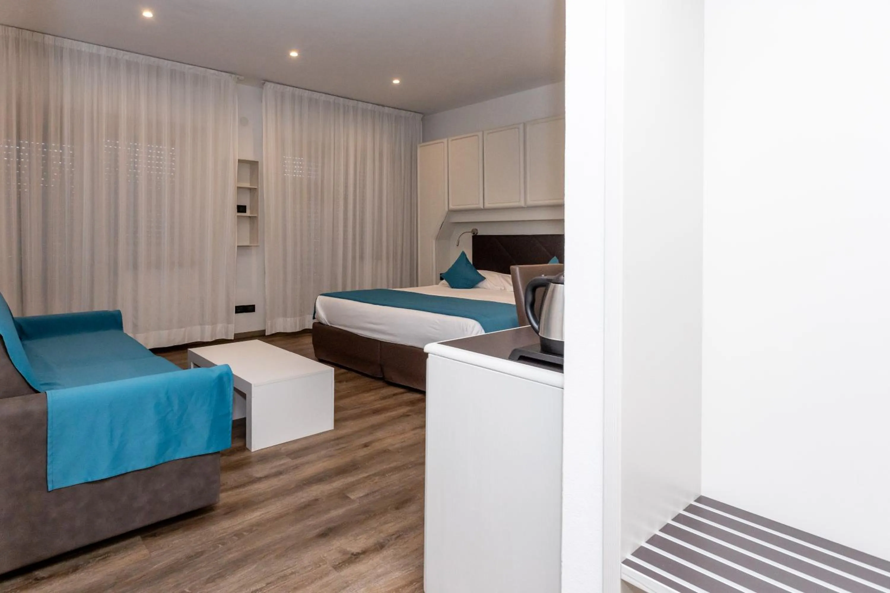 Bed in Albergo Cappello e Cadore