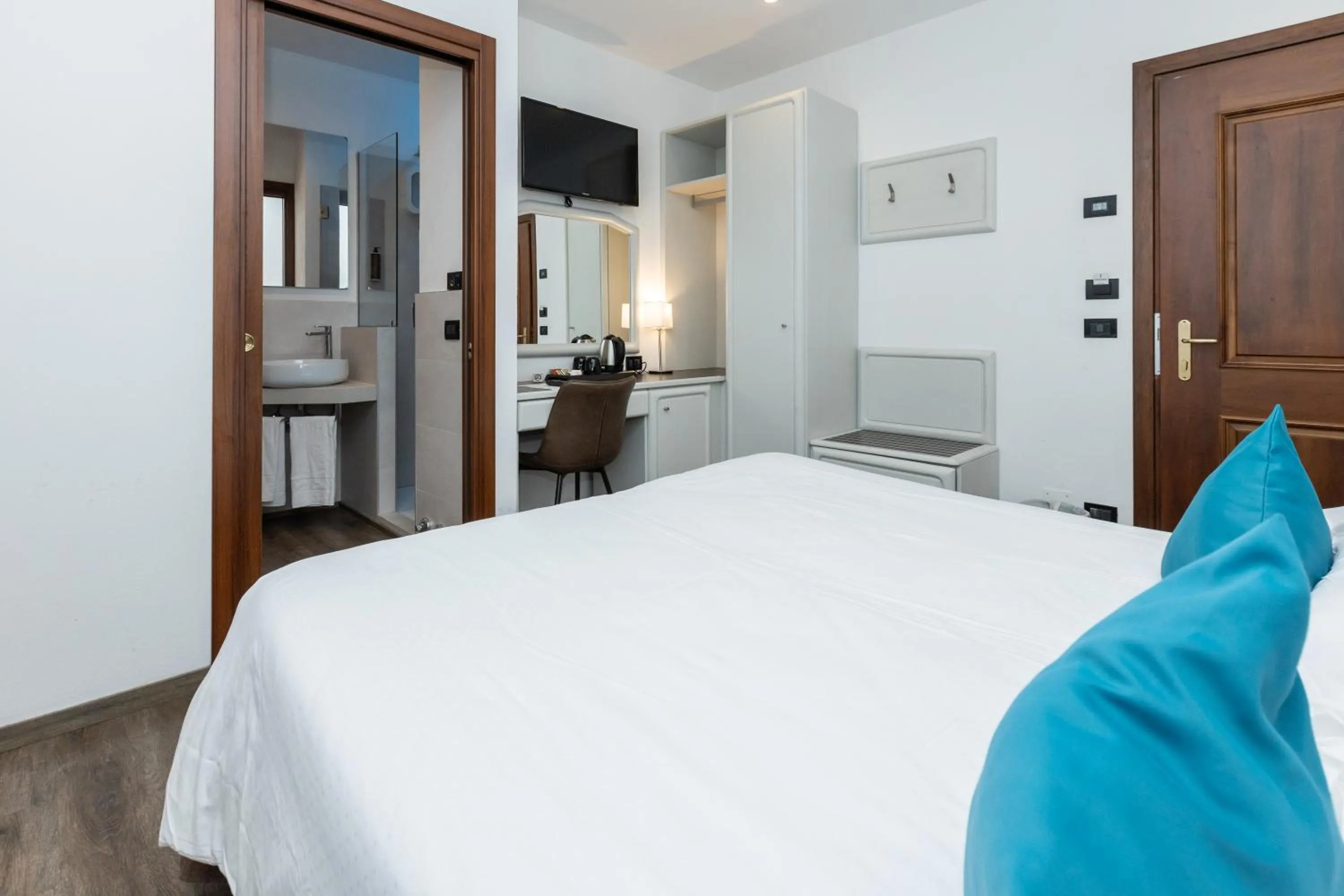 Bed in Albergo Cappello e Cadore