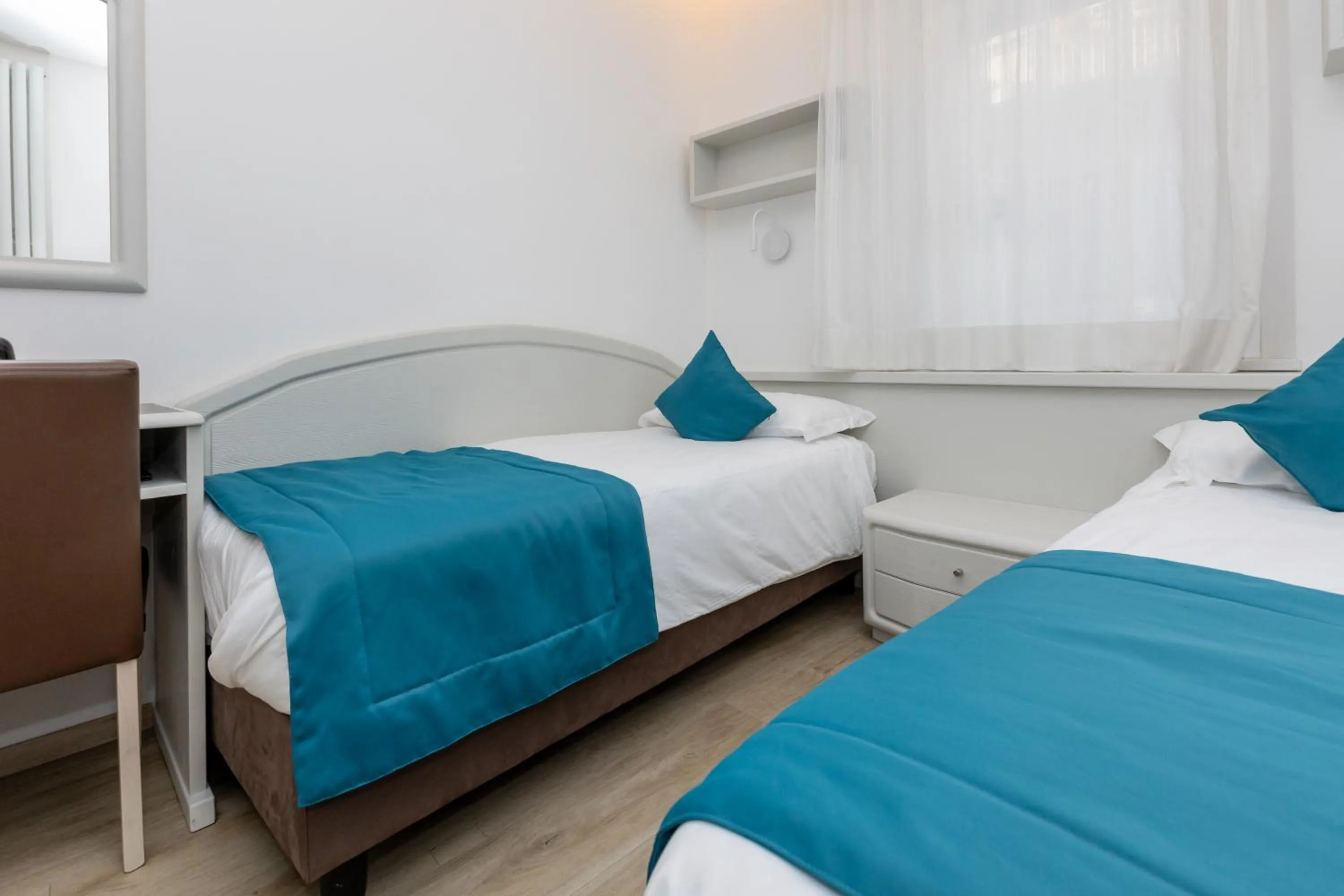 Bed in Albergo Cappello e Cadore