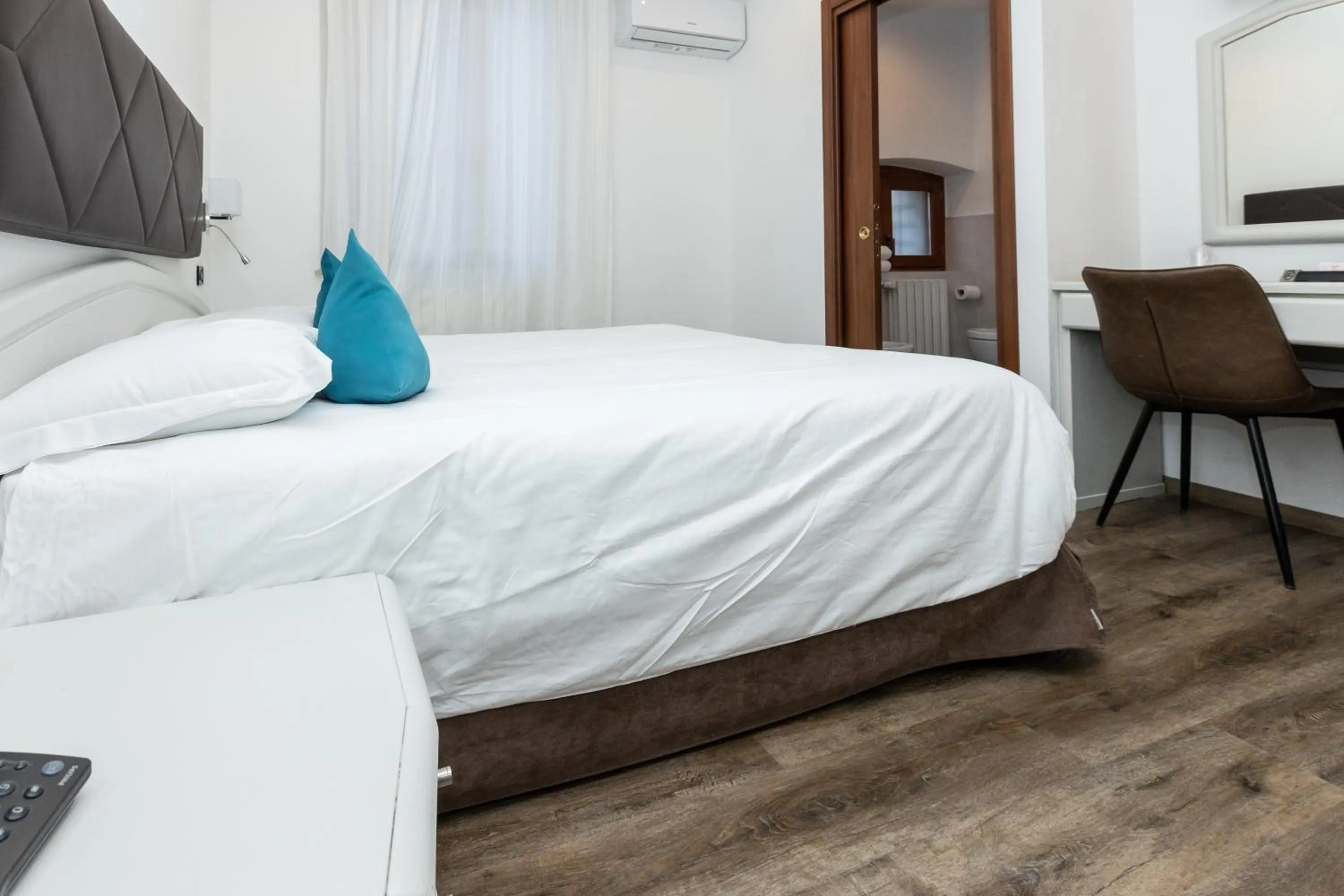 Bed in Albergo Cappello e Cadore