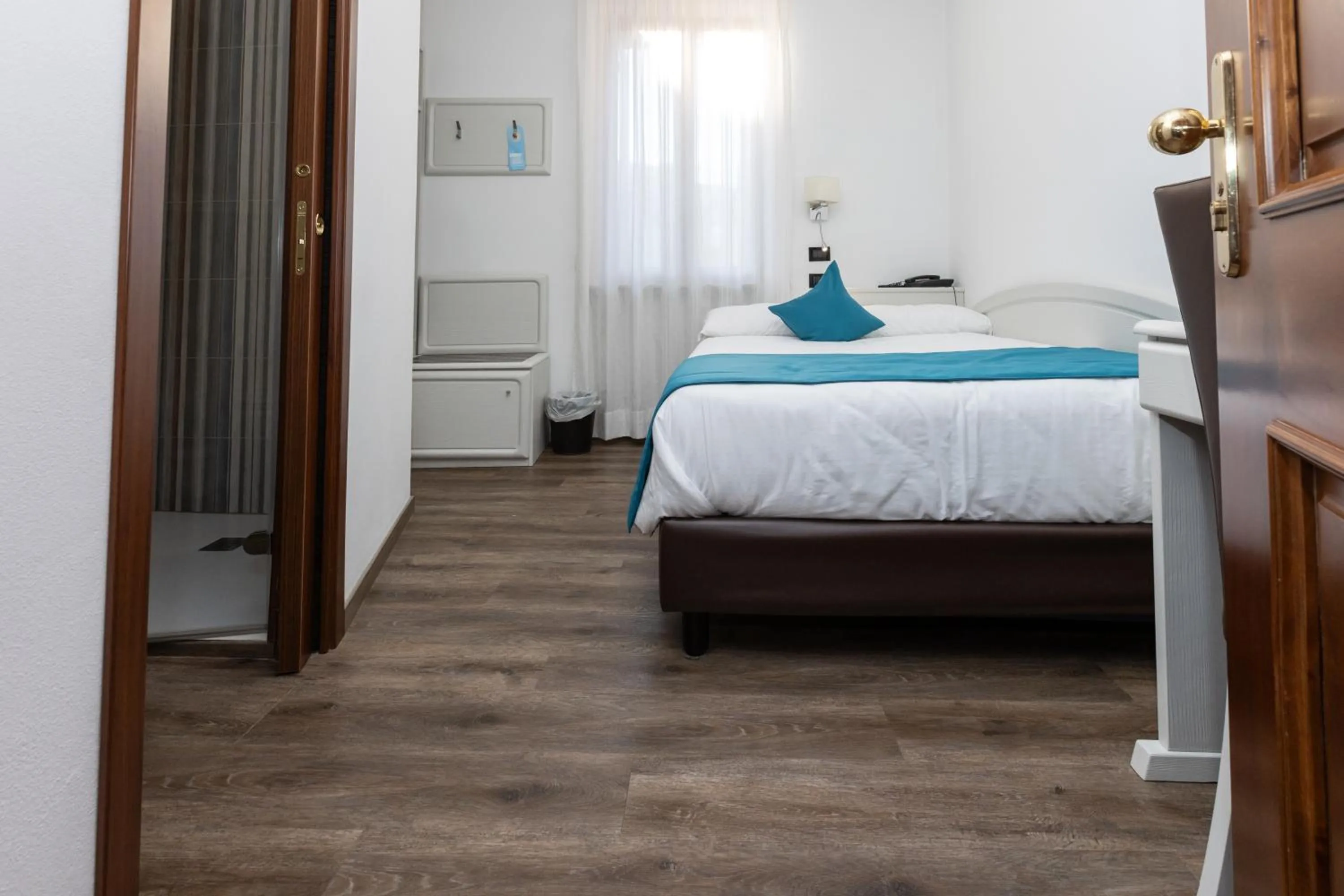 Bed in Albergo Cappello e Cadore