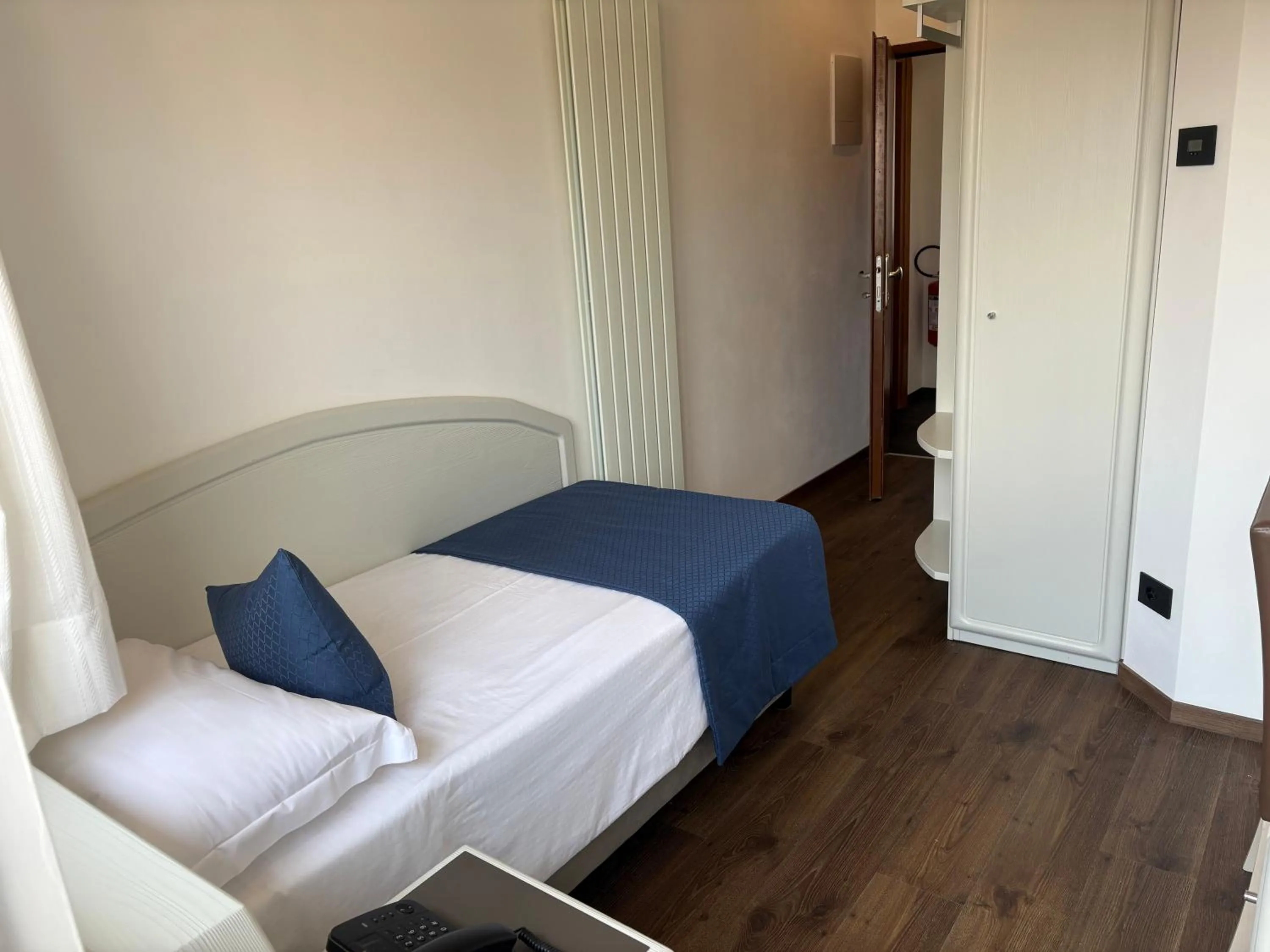 Bed in Albergo Cappello e Cadore