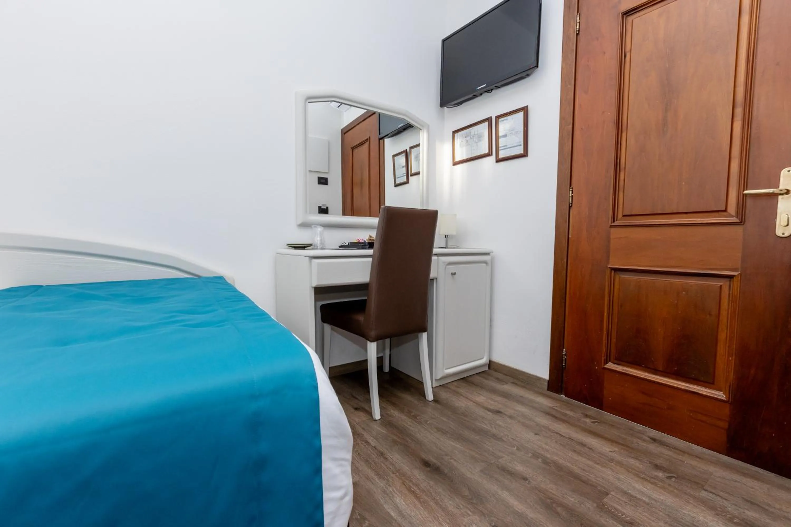 Bed in Albergo Cappello e Cadore