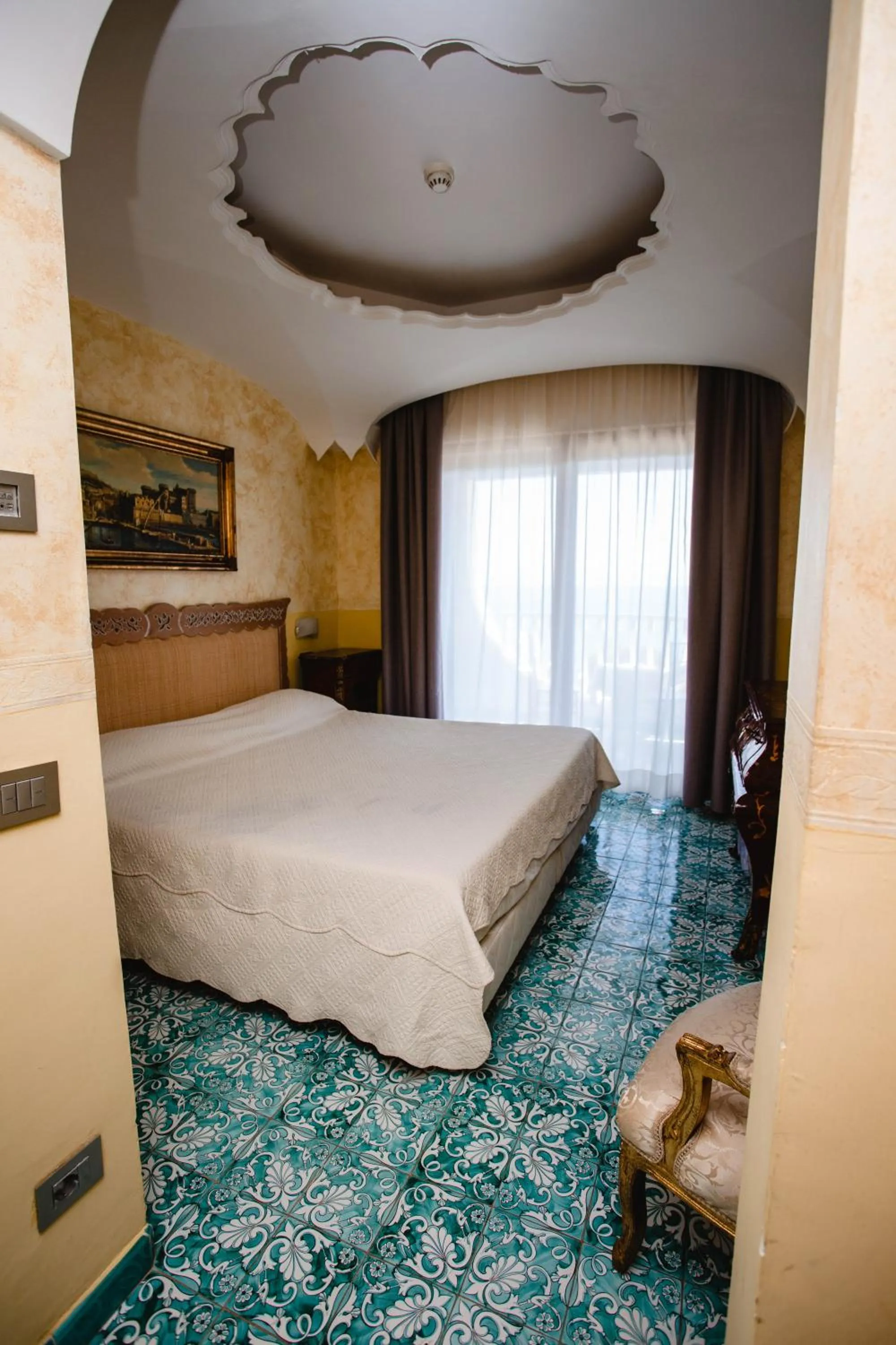 Bed in Strand Hotel Delfini