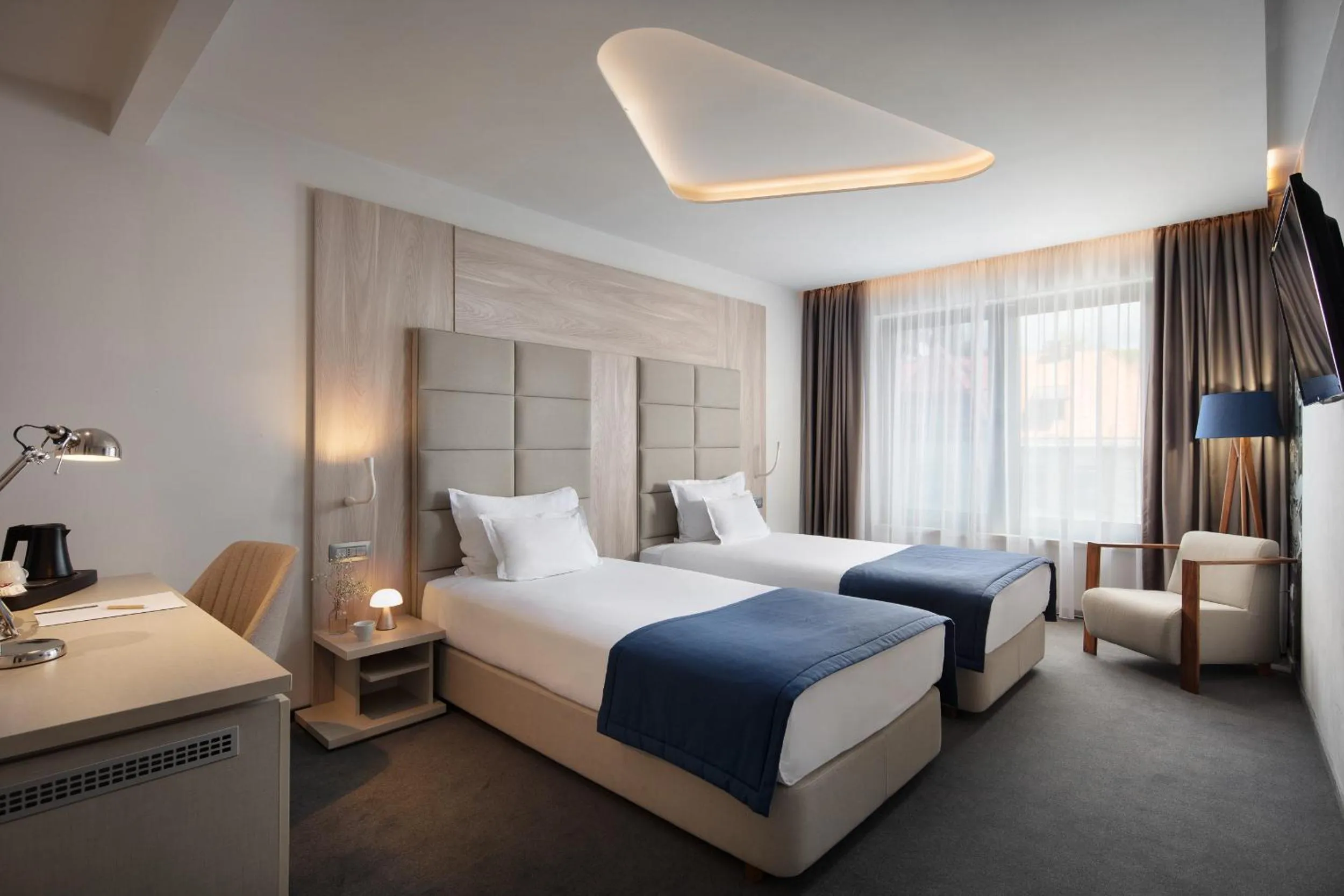 Bed in Hotel Colors Inn