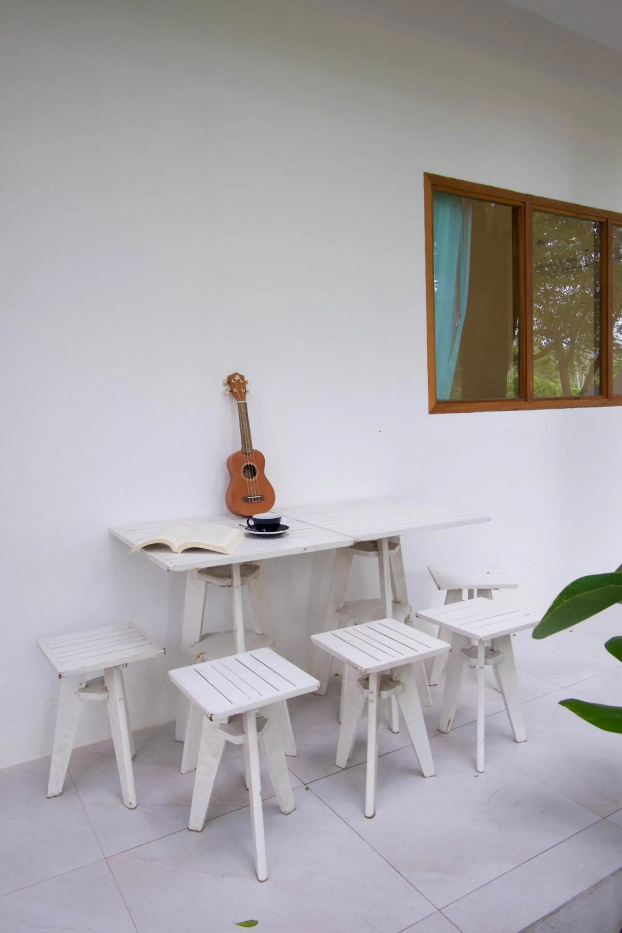 Seating area in Issara Beach Resort Beachfront