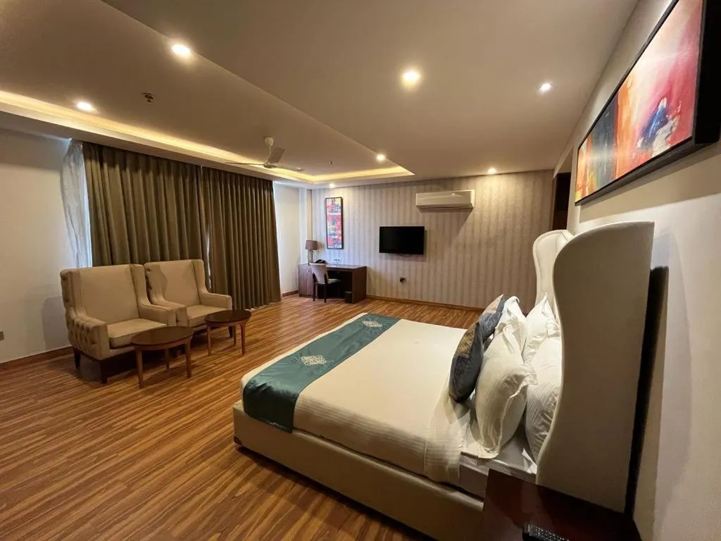 Bed in Pinaka Hotels & Resorts