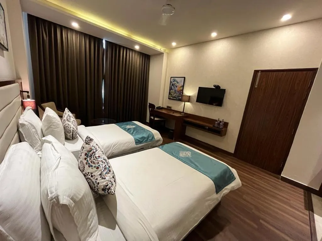 Photo of the whole room, Bed in Pinaka Hotels & Resorts