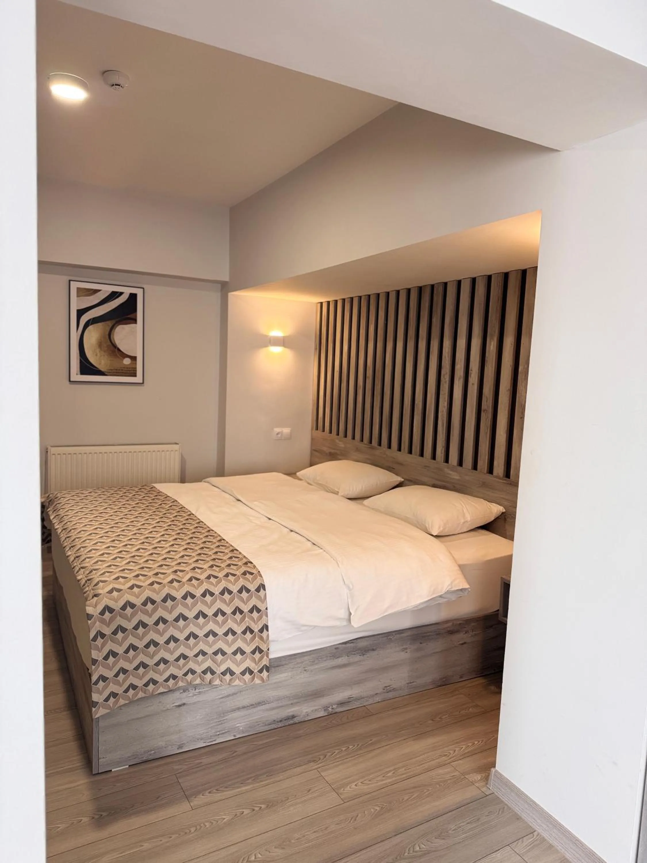 Bed in Aventus Hotel