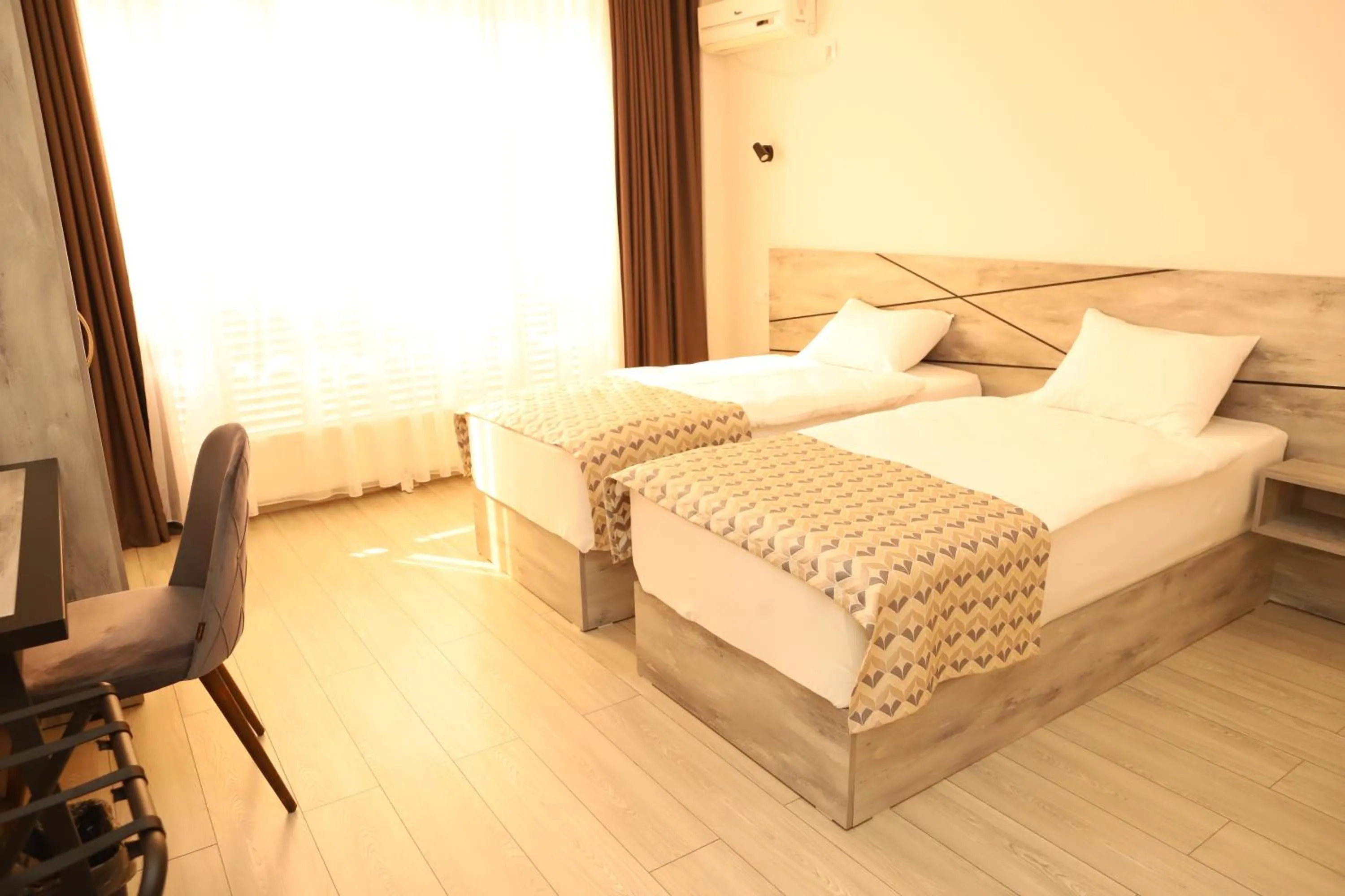 Bed in Aventus Hotel