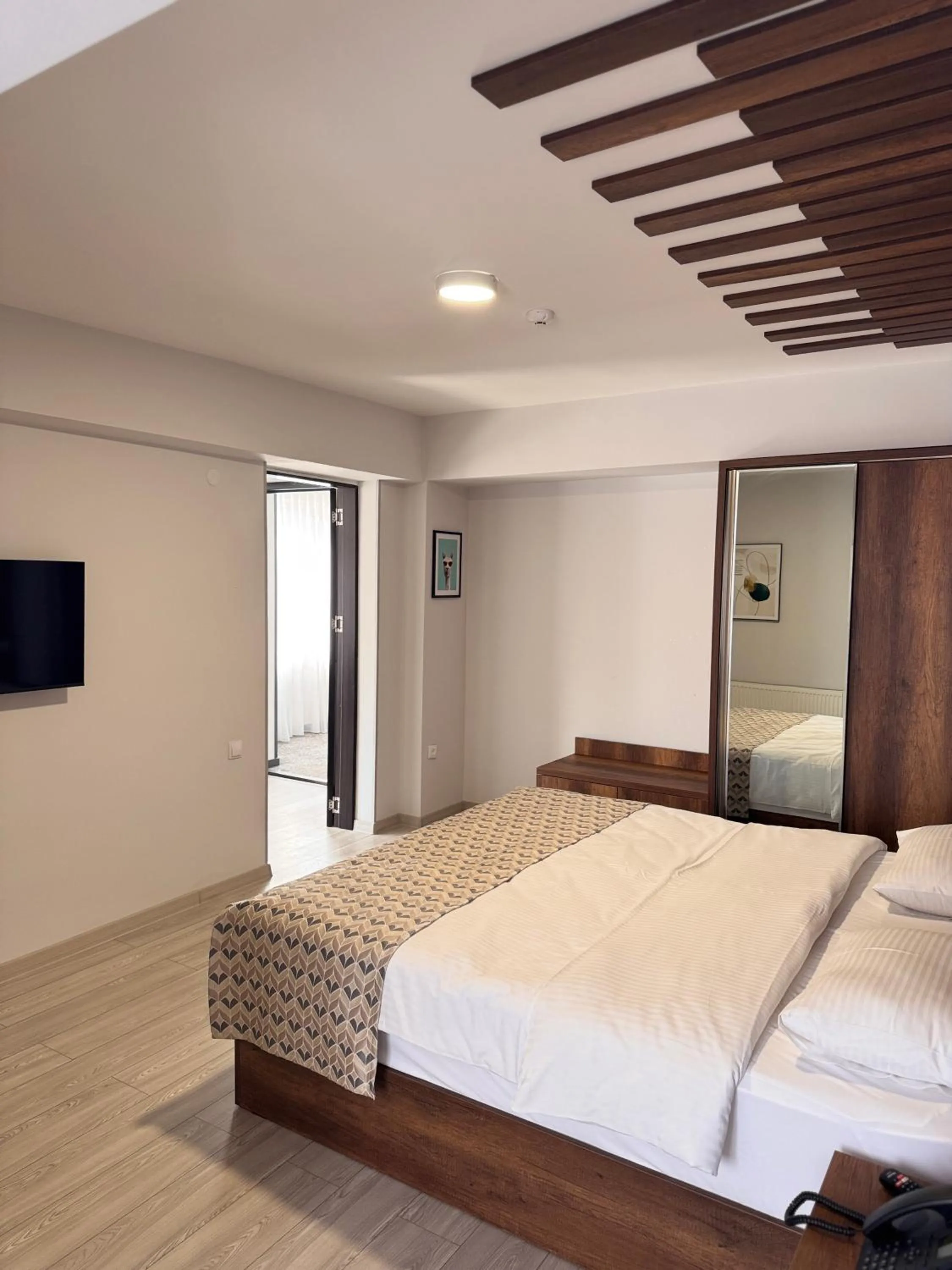 Bed in Aventus Hotel