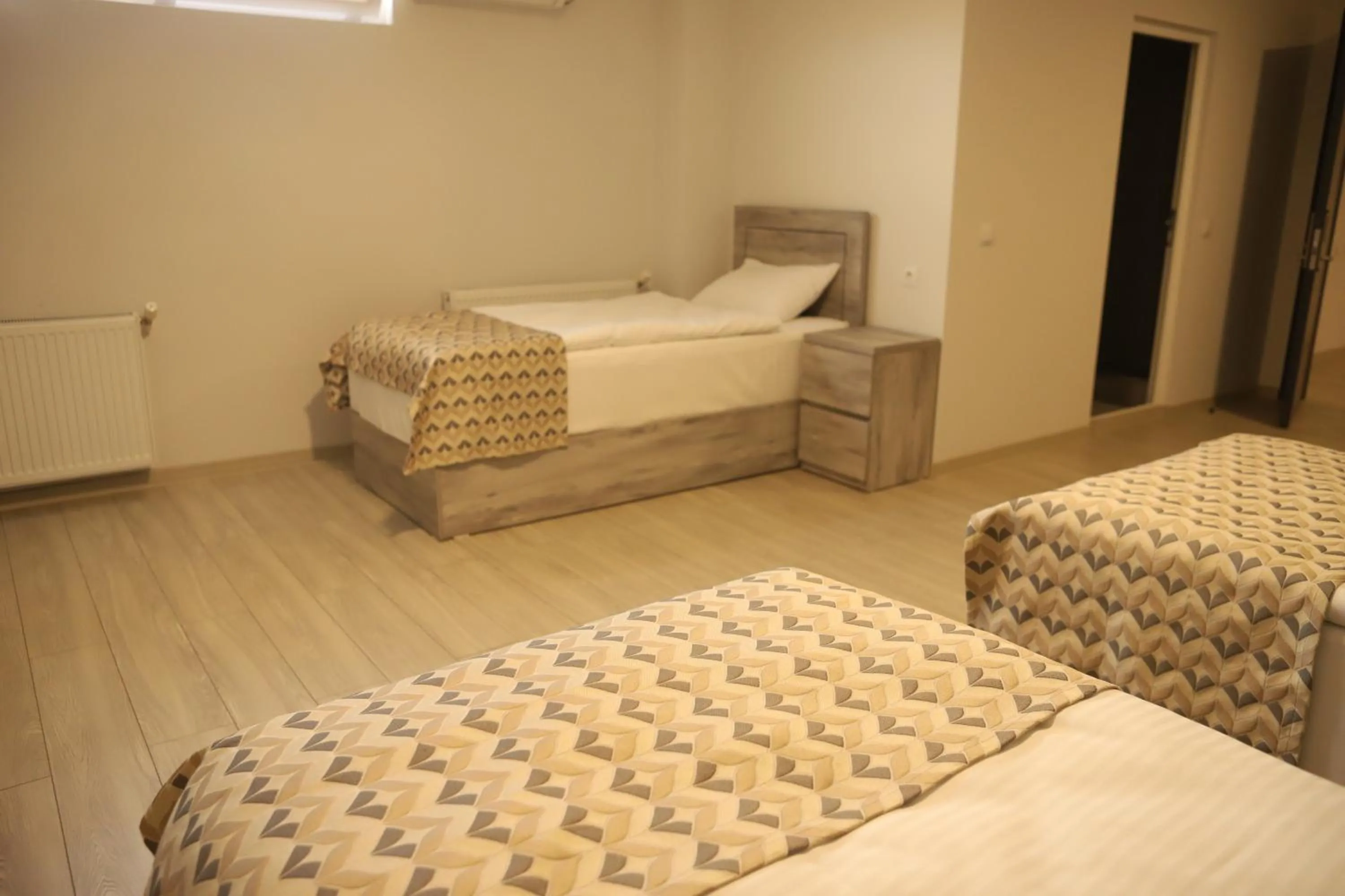 Bed in Aventus Hotel