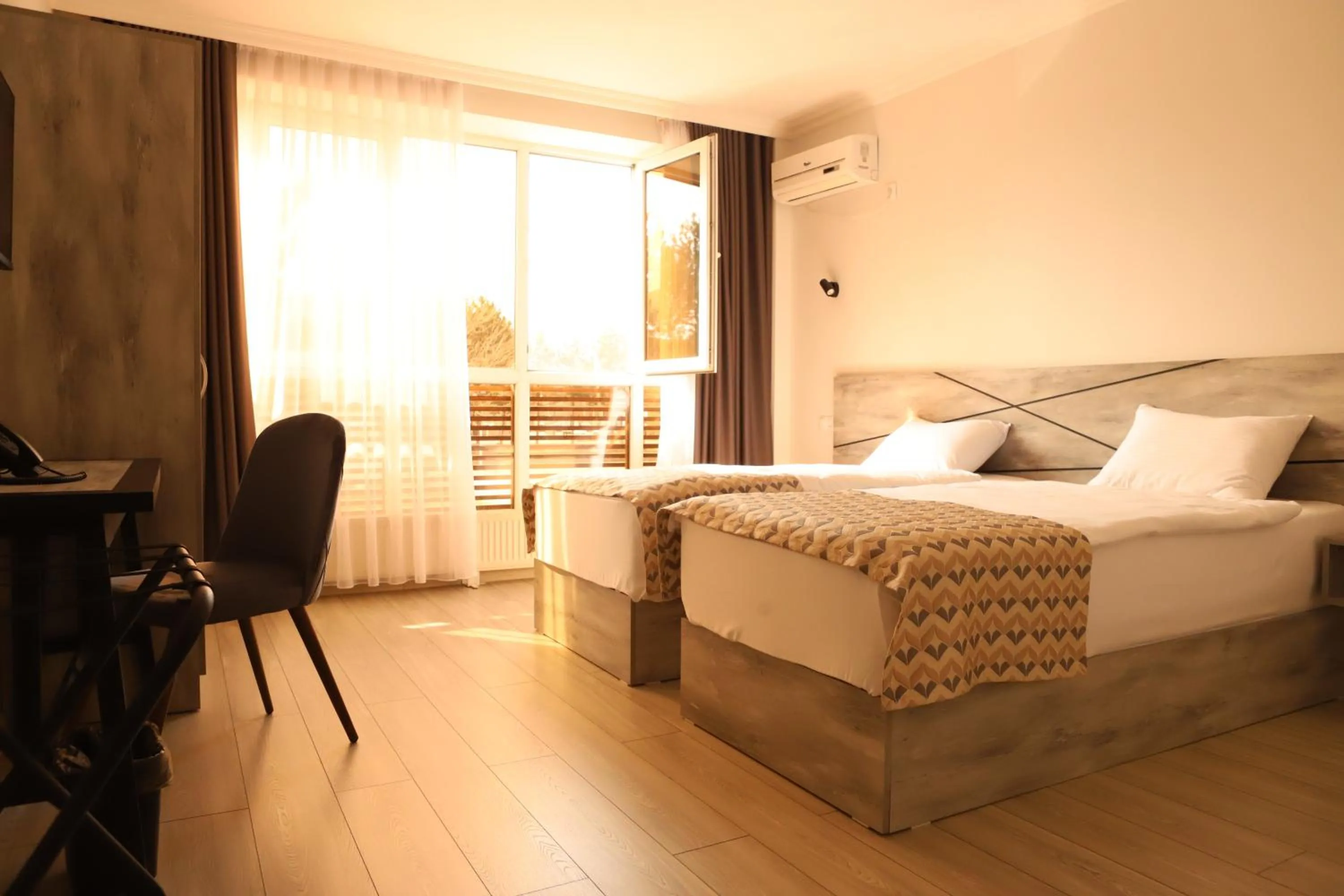 Bed in Aventus Hotel