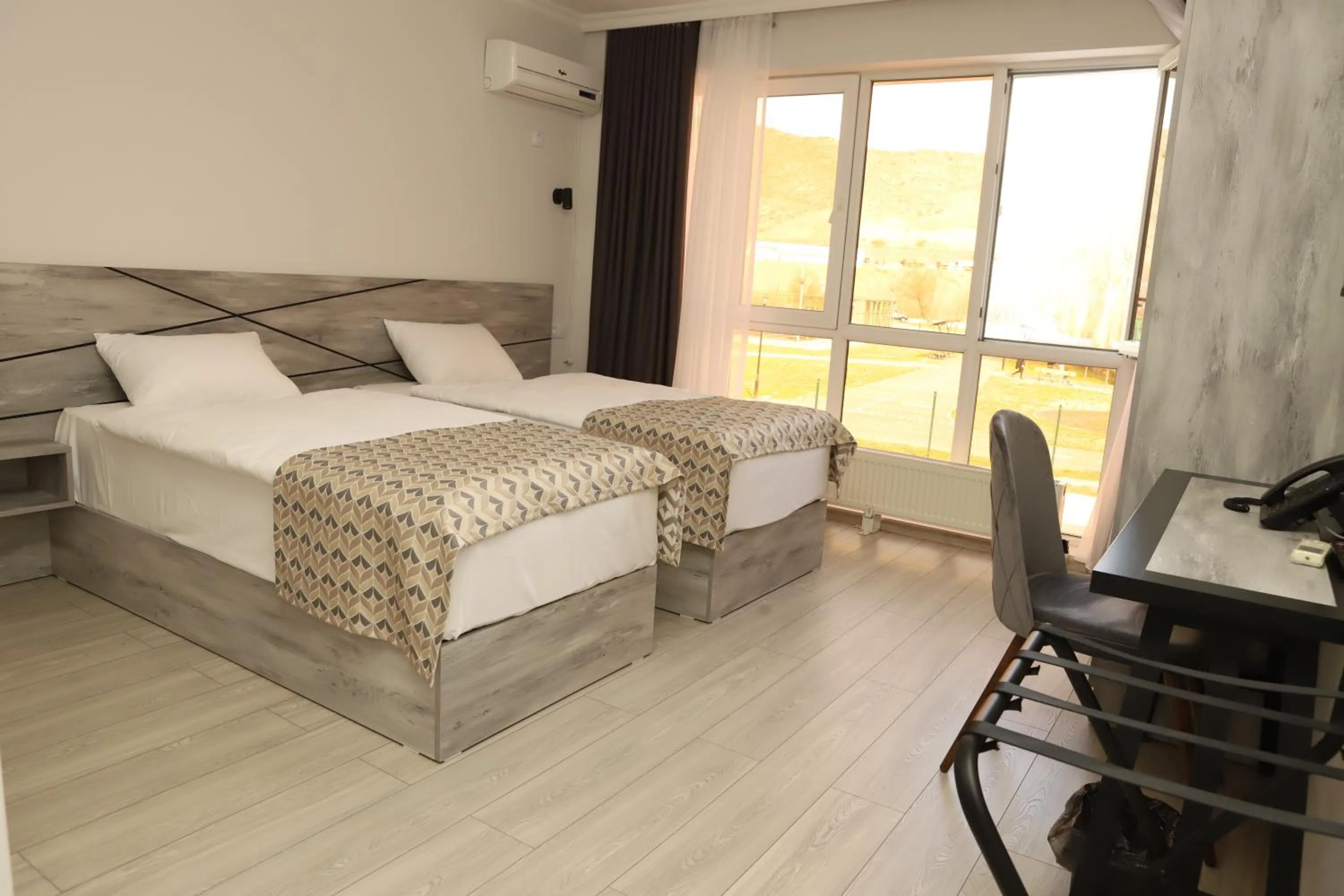 Bed in Aventus Hotel