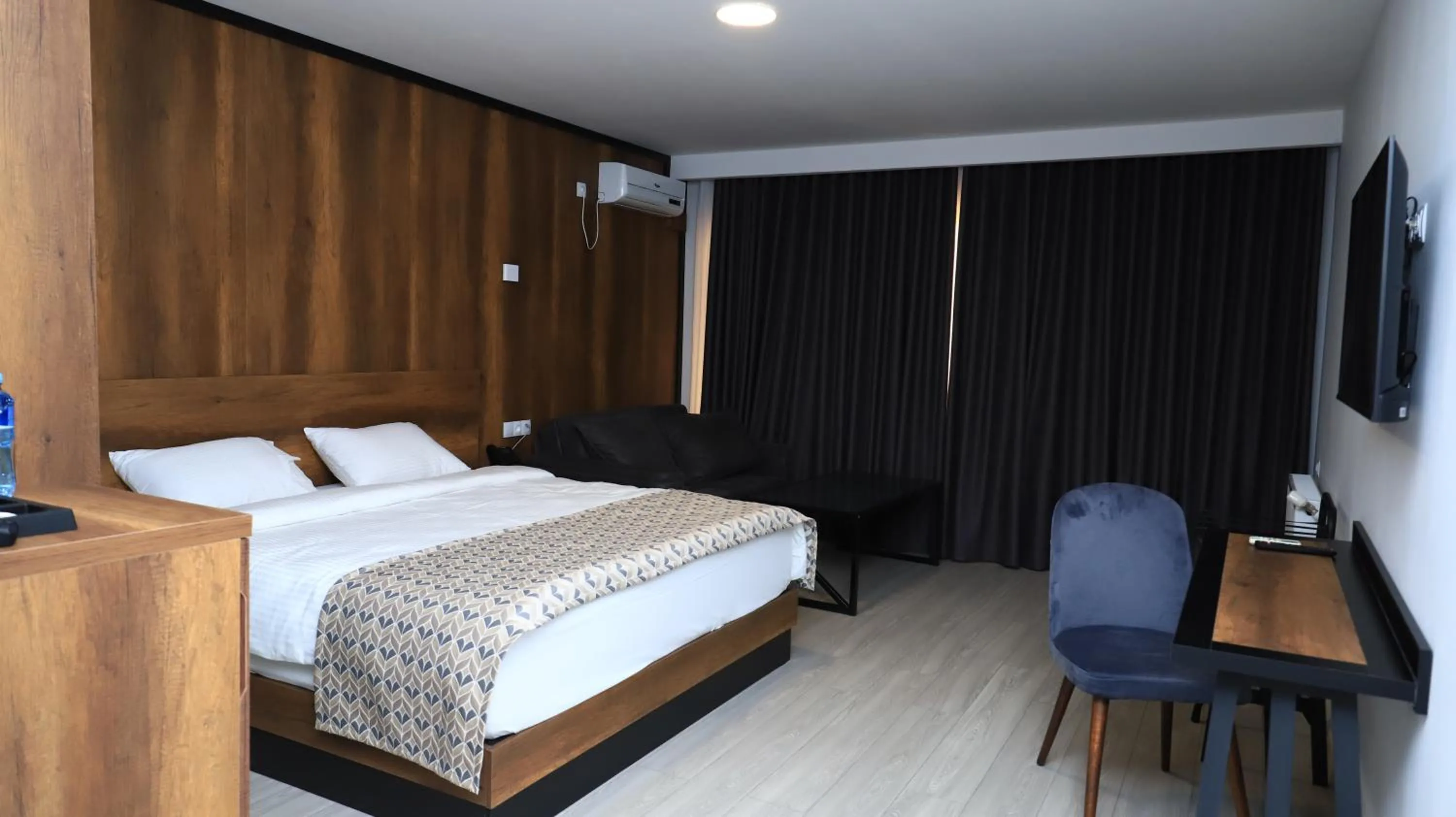 TV and multimedia, Bed in Aventus Hotel