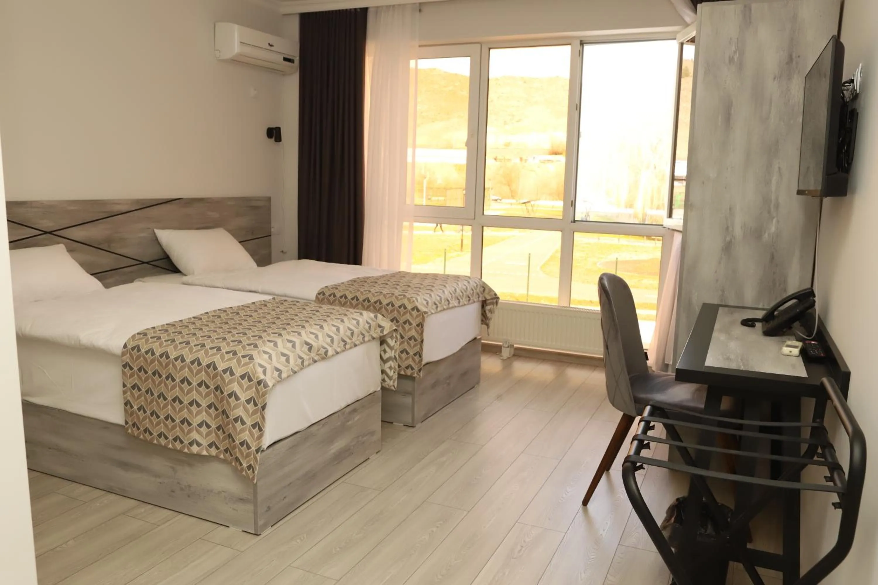 Bed in Aventus Hotel