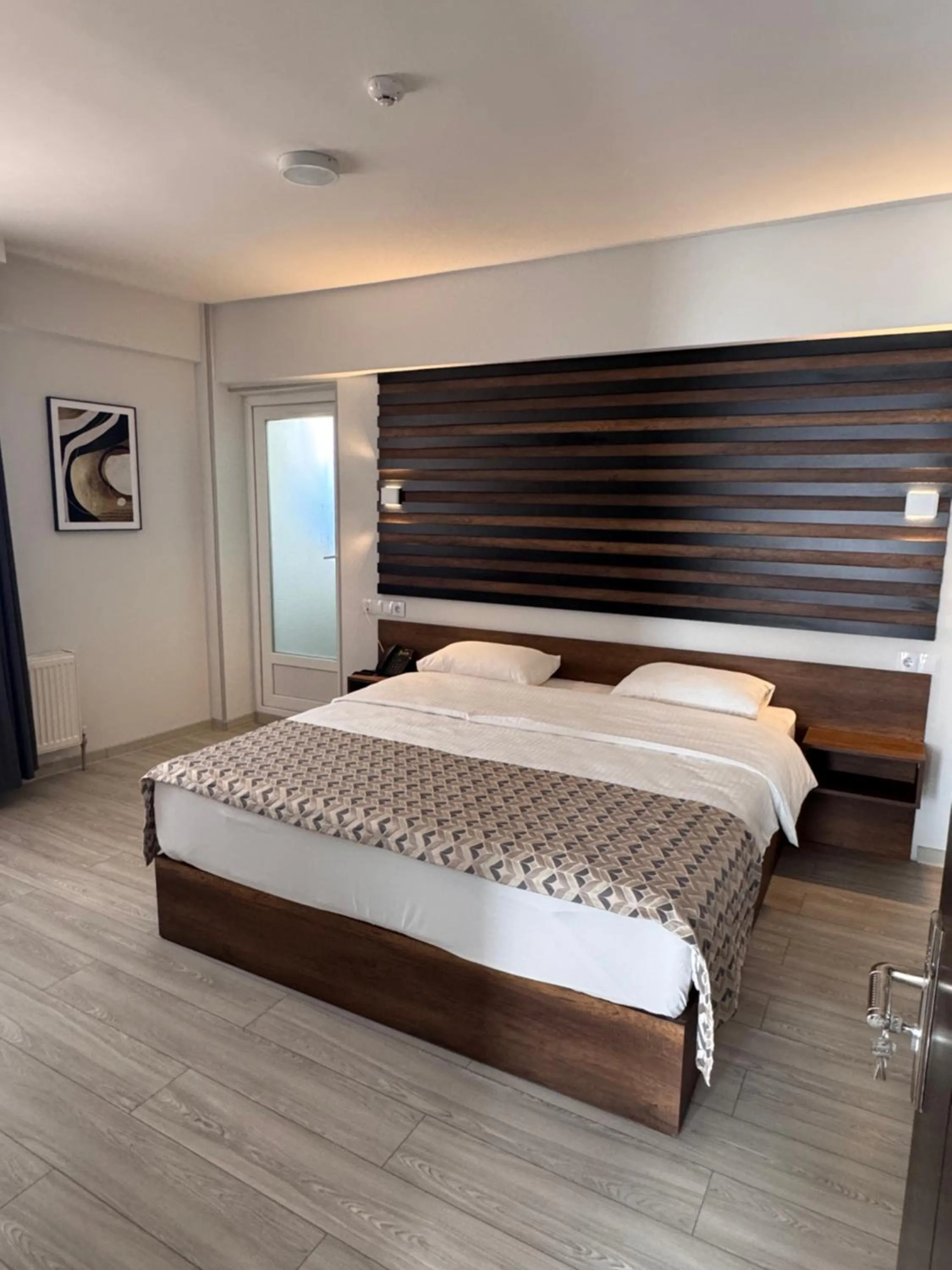 Bed in Aventus Hotel