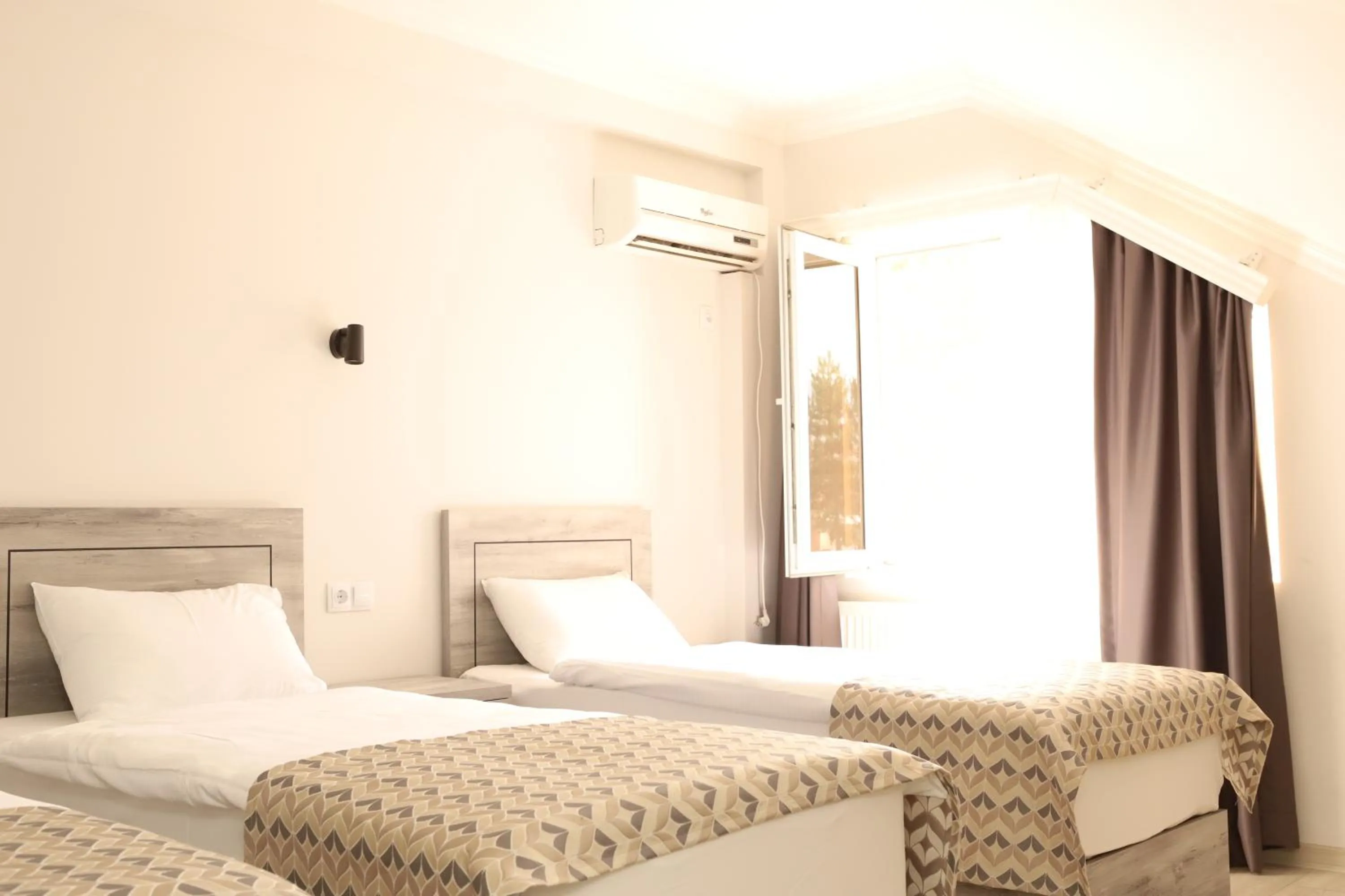 Bed in Aventus Hotel