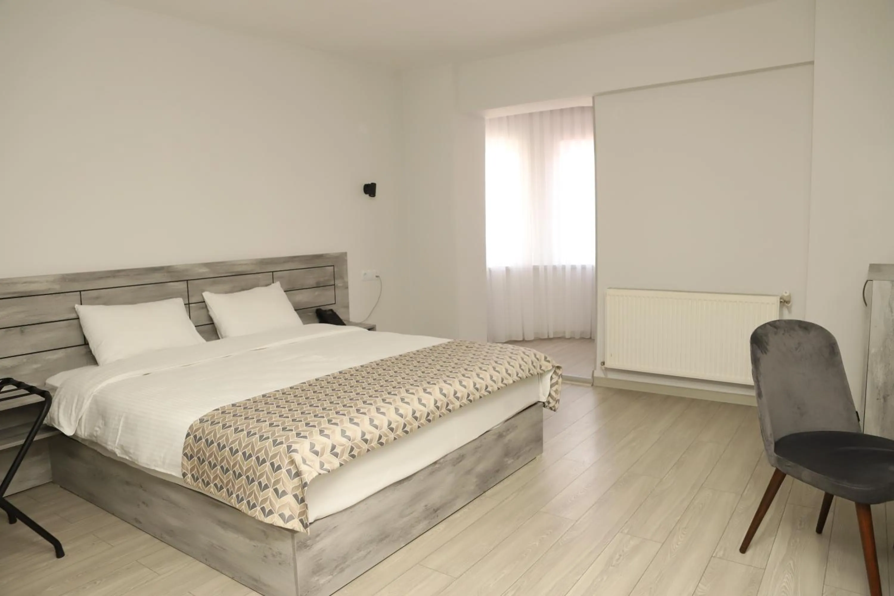 Bed in Aventus Hotel