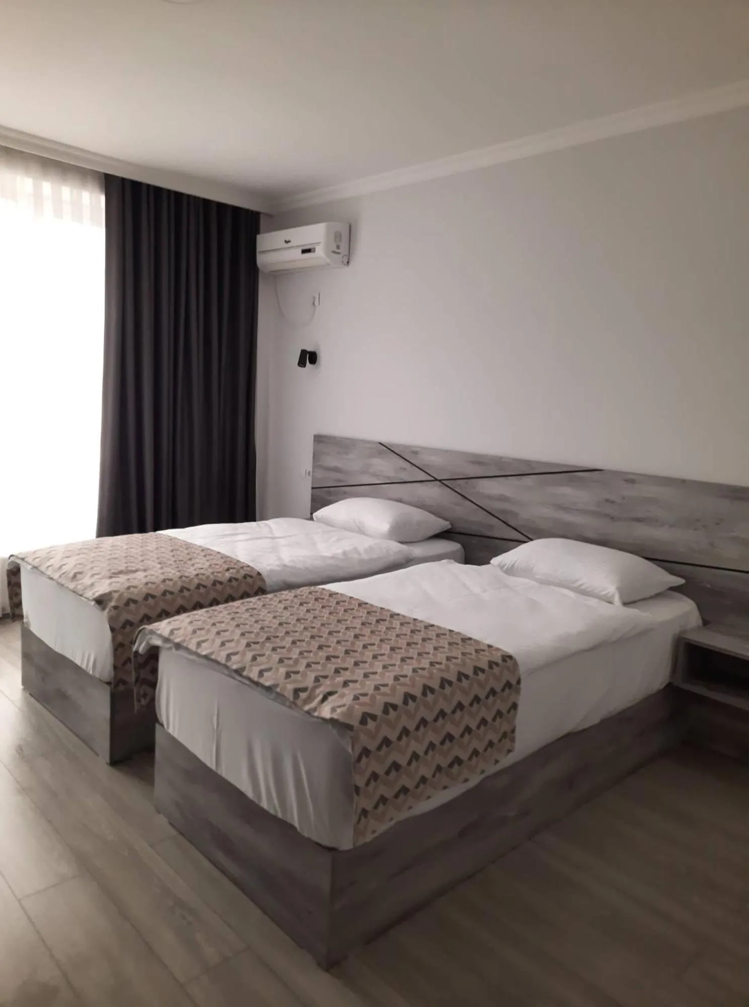 Bed in Aventus Hotel