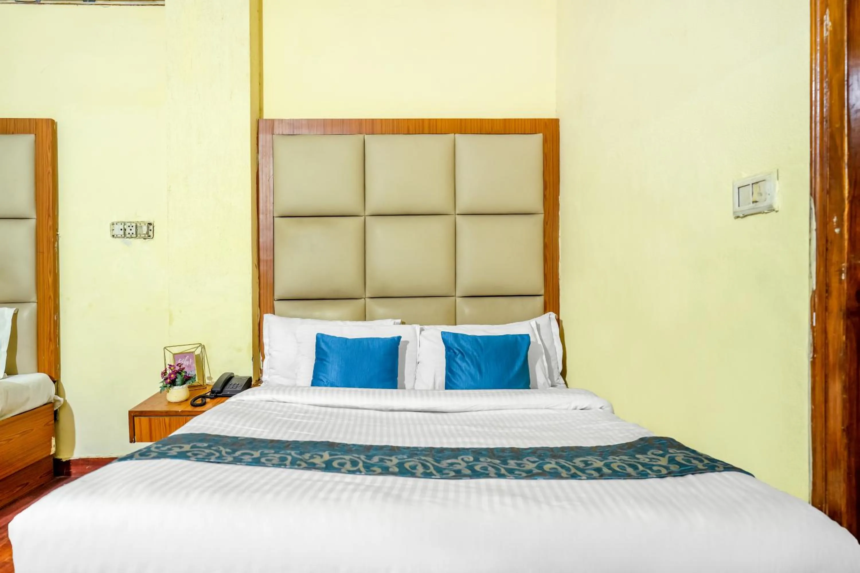 Bed in Hotel Abhi international