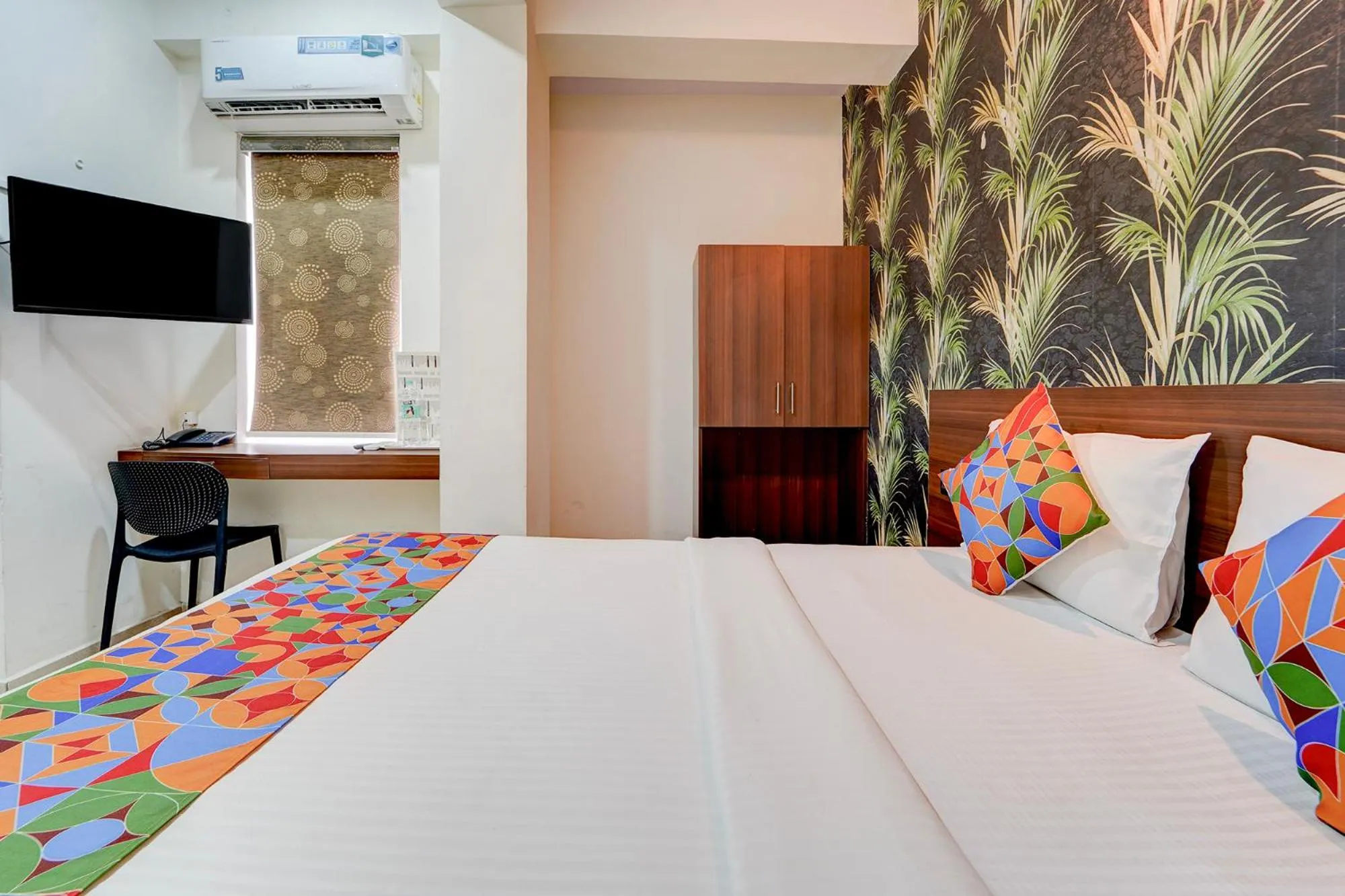 Bed in FabHotel NRM Residency