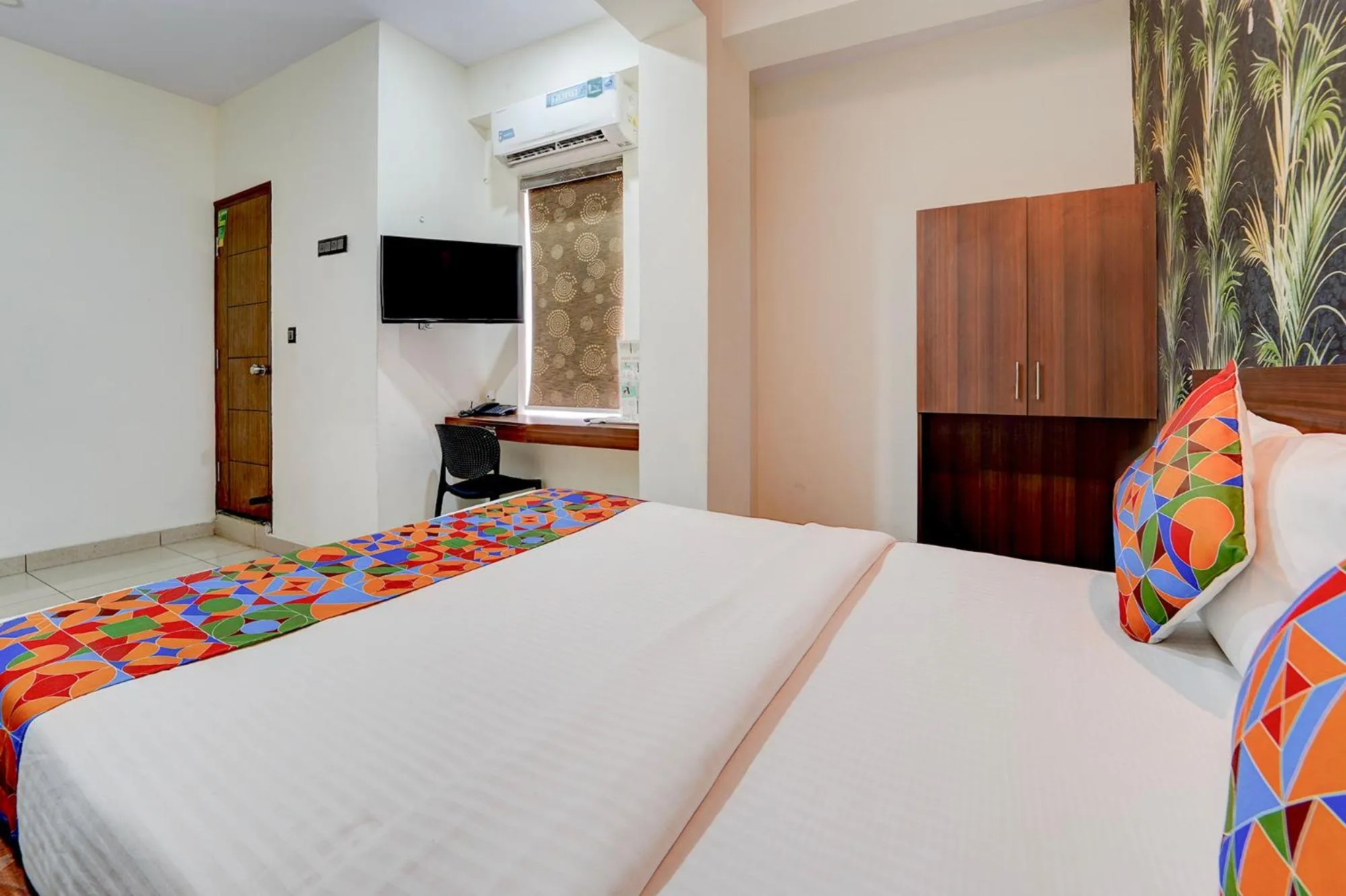 Bed in FabHotel NRM Residency