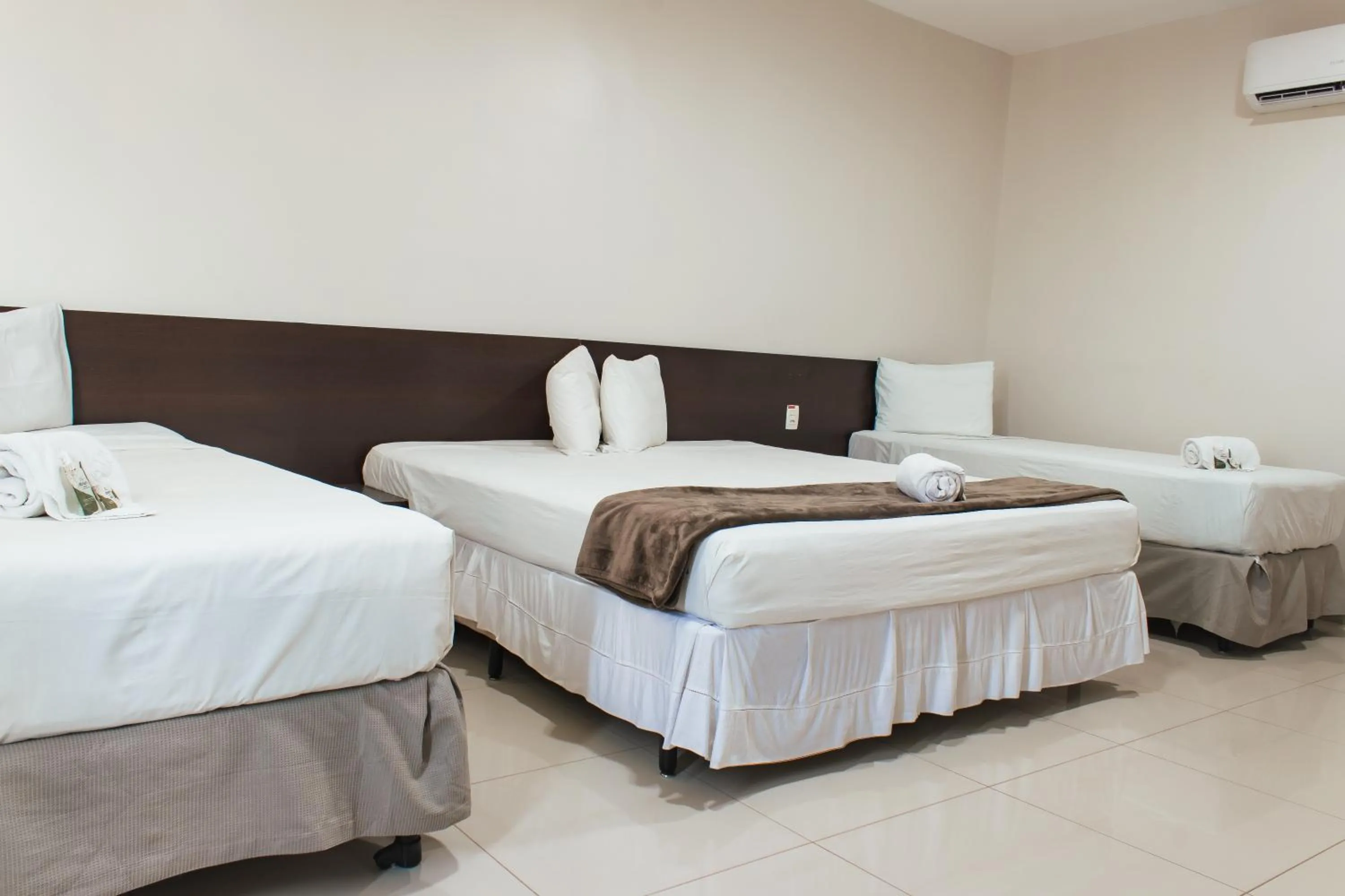 Bed in Atrium Express Hotels