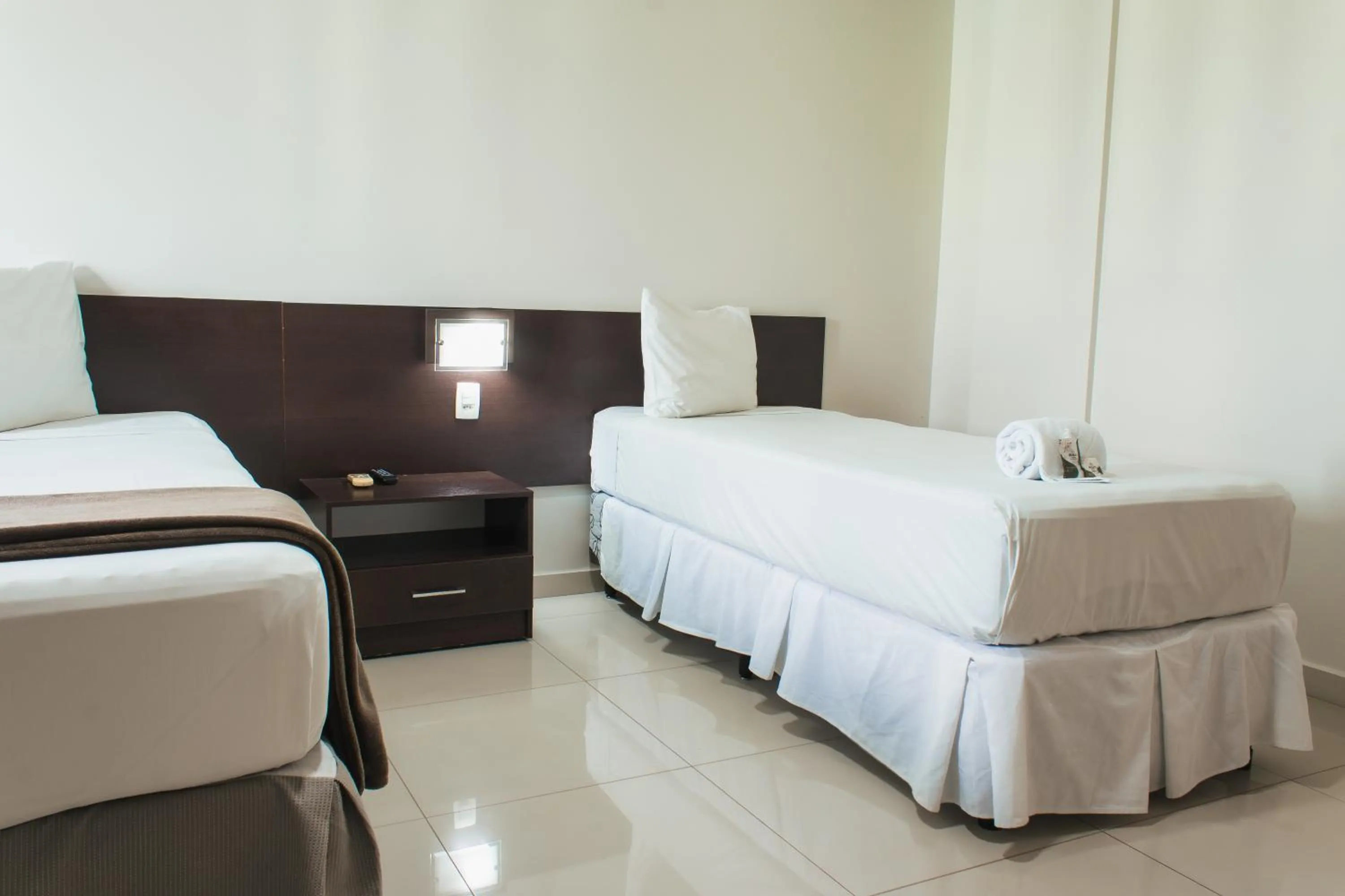 Bed in Atrium Express Hotels